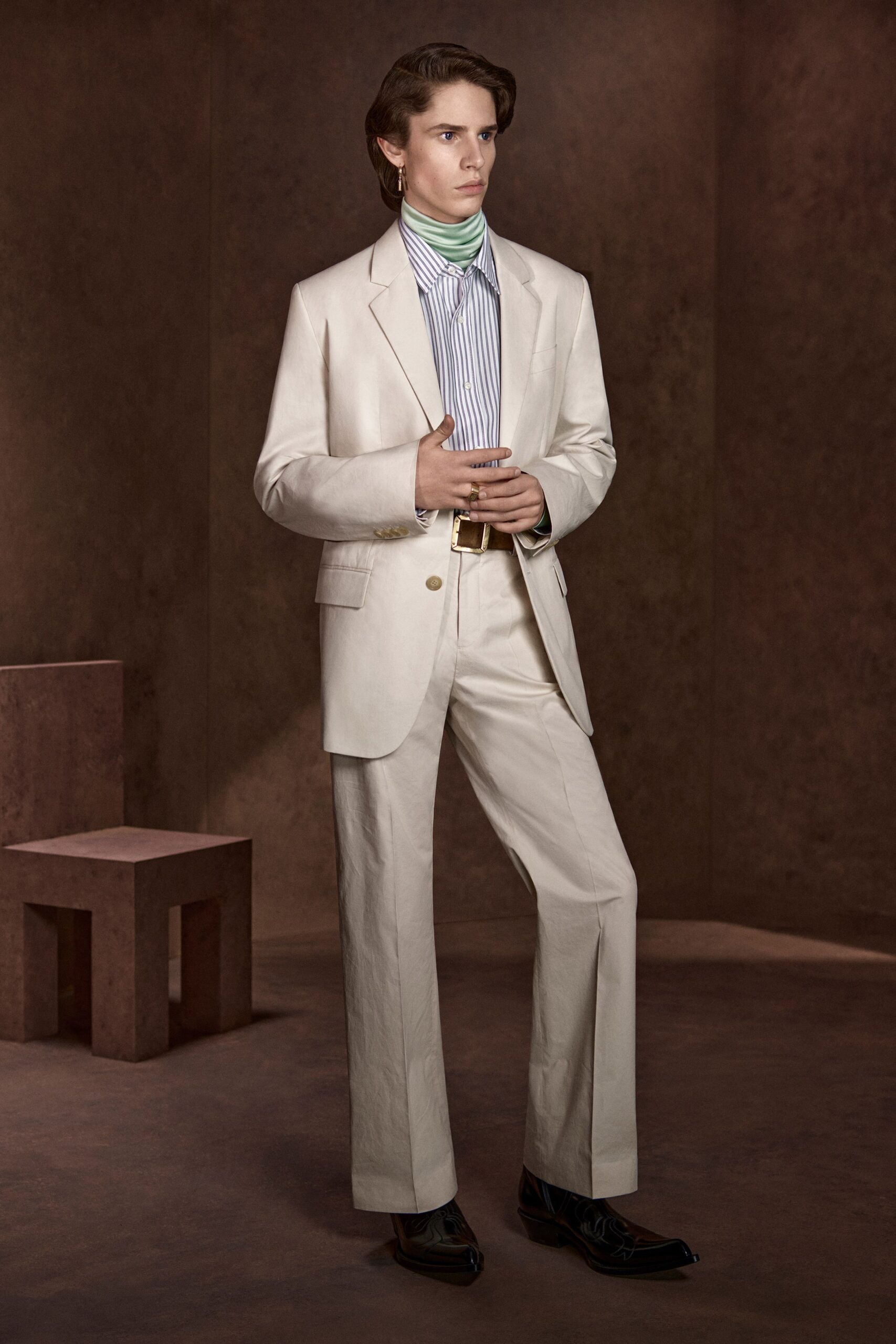 white tailored suit with striped shirt