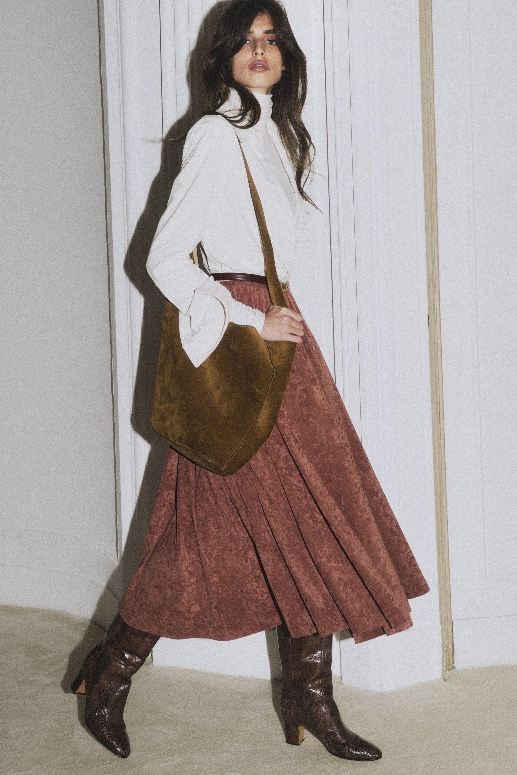 white blouse brown pleated skirt