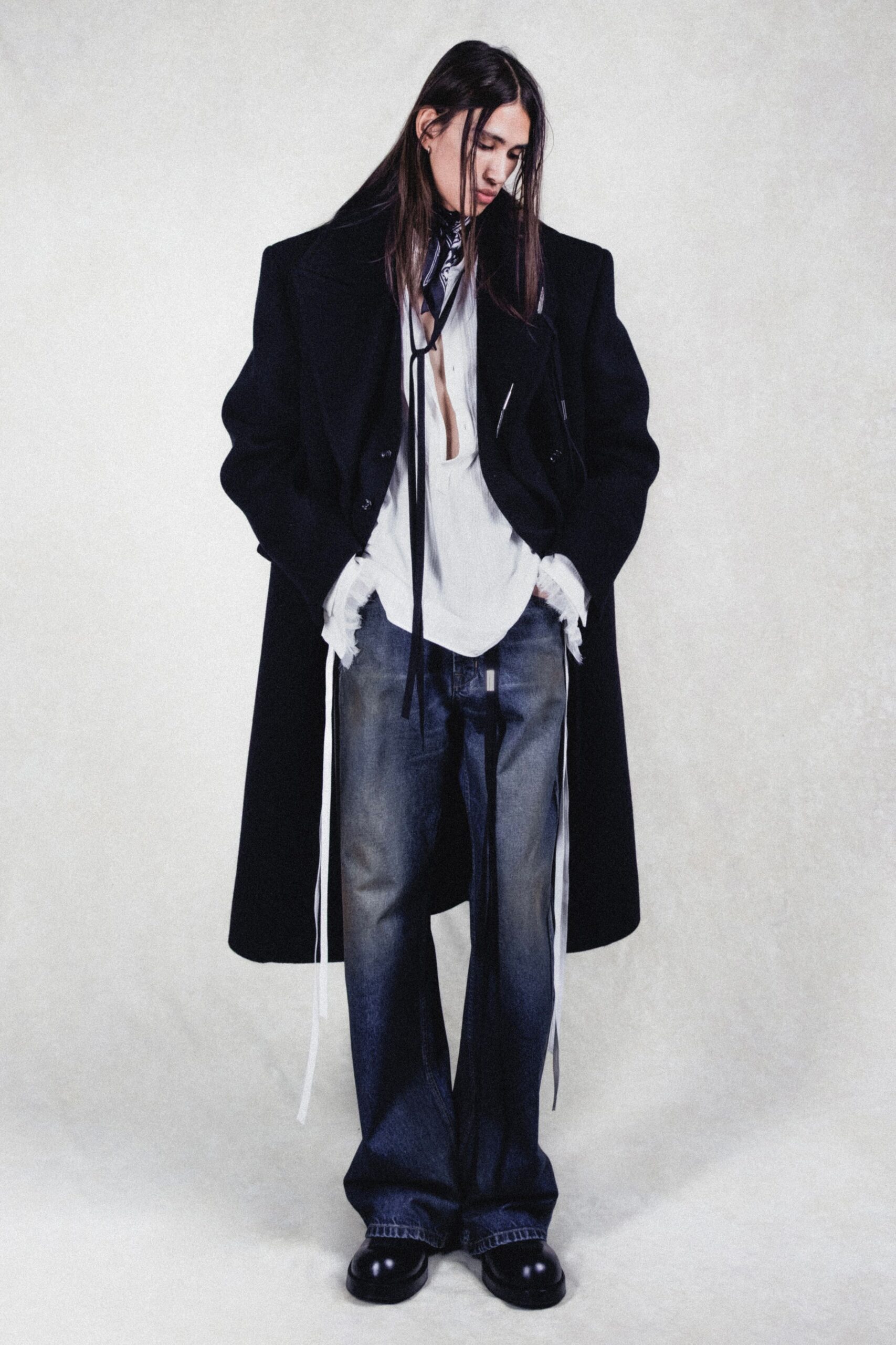 black wool long-sleeve collared relaxed buttoned coat