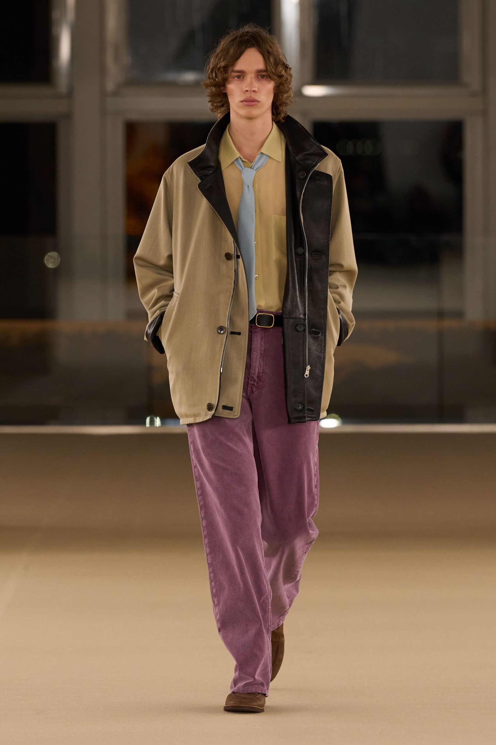 beige black jacket yellow shirt purple pants