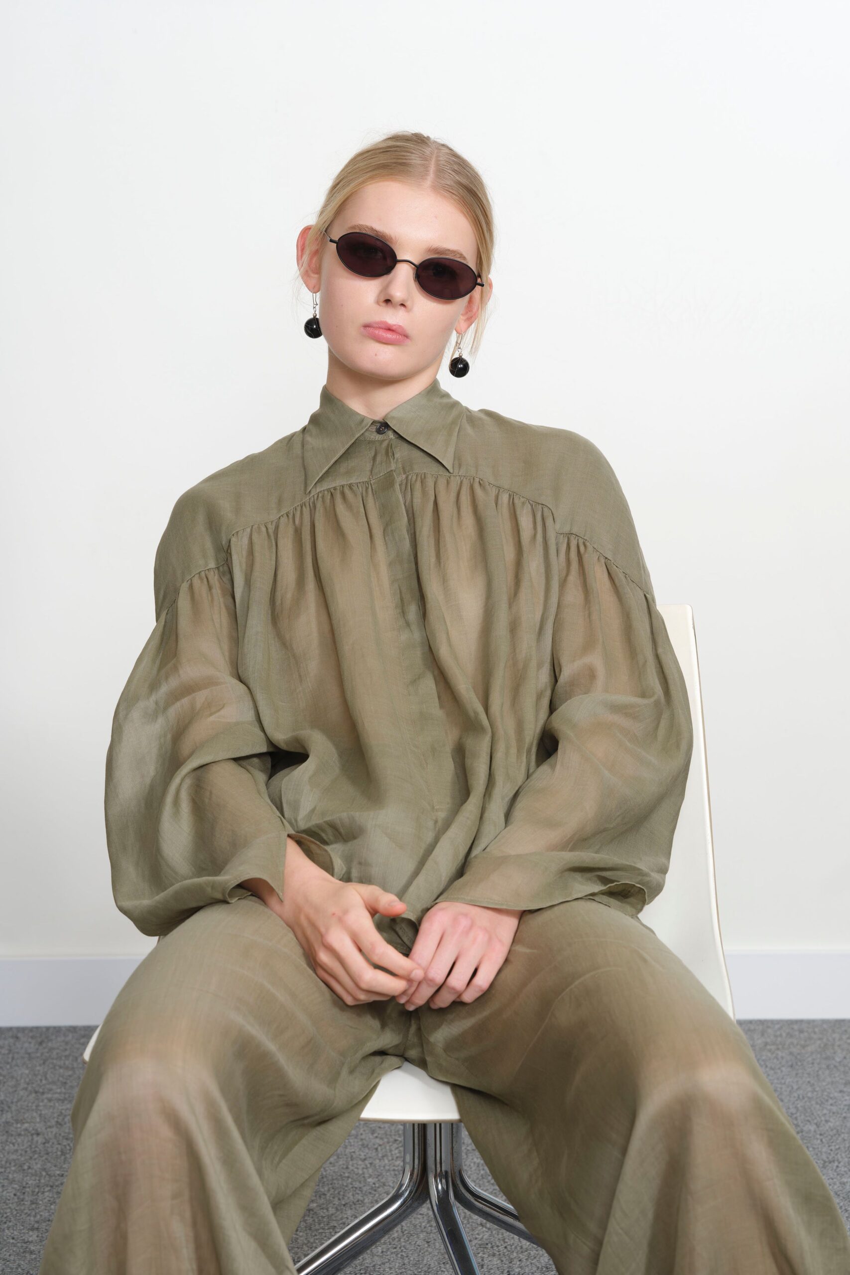 green cotton long-sleeve collared relaxed pleated sheer shirt