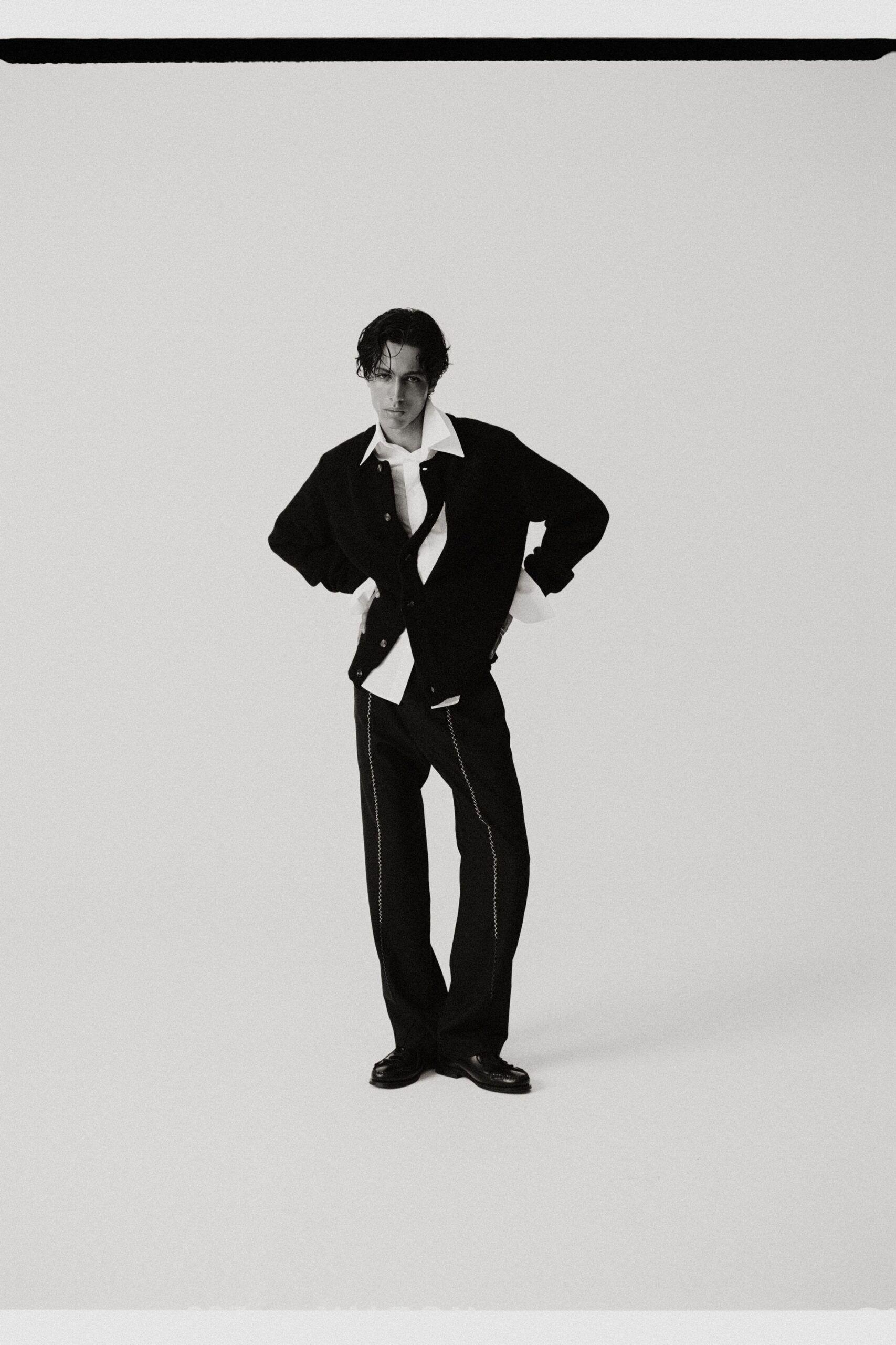 black wool jacket white shirt black pants