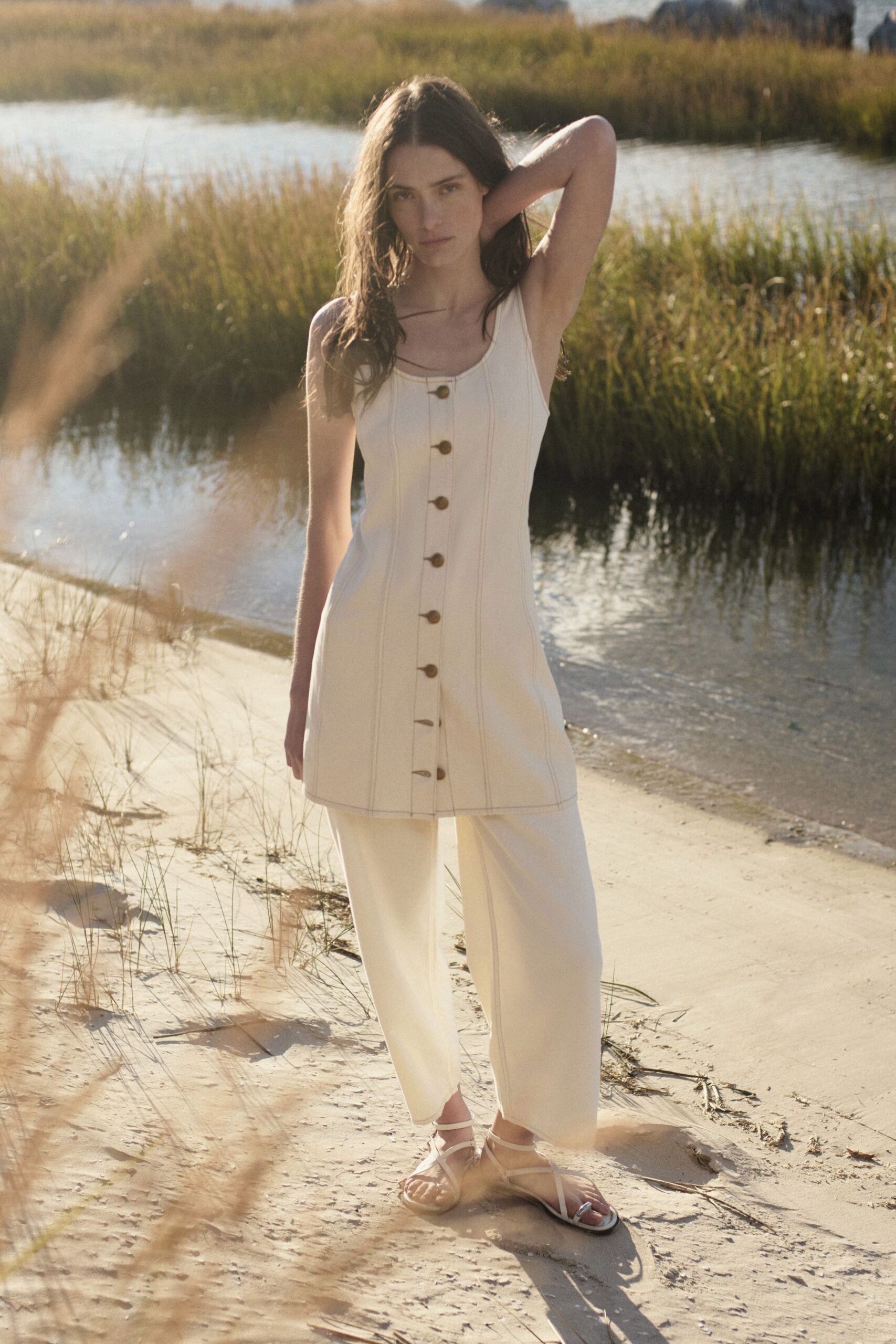 beige cotton sleeveless v-neck fitted buttoned short dress