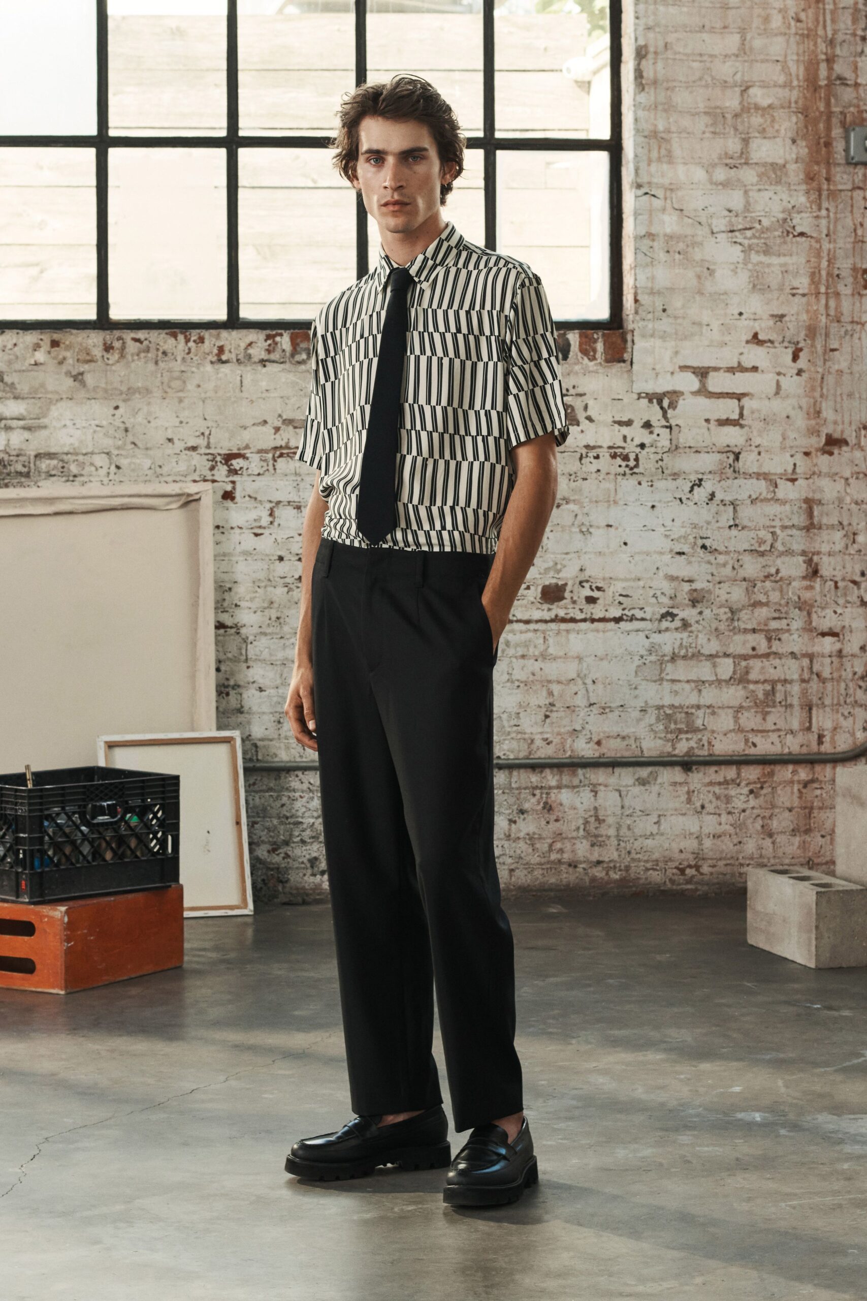 black and white printed shirt with relaxed pants