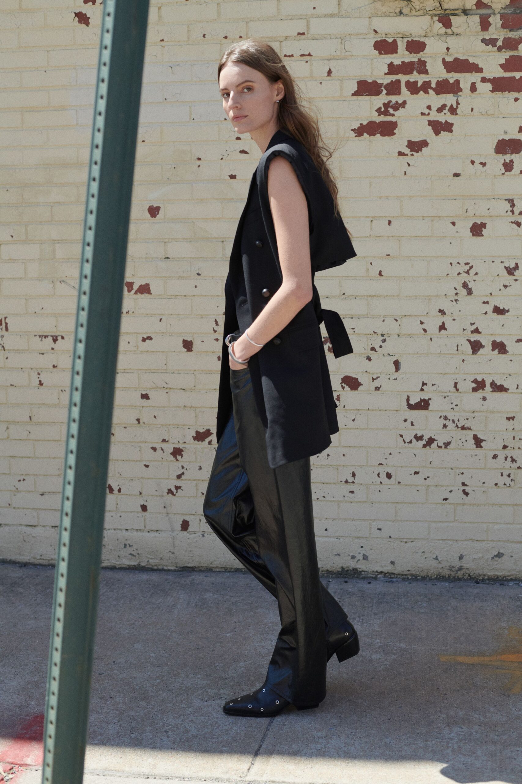 black fitted vest and pants