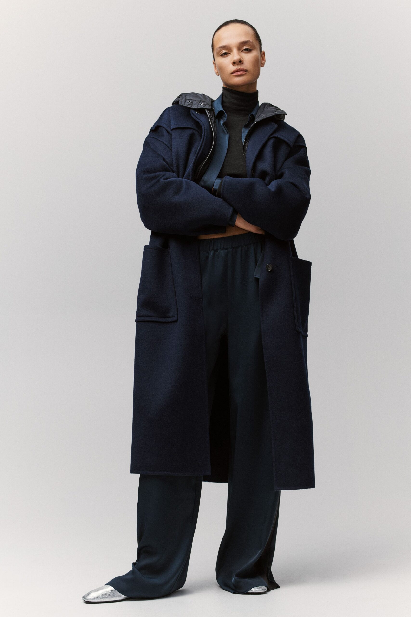 navy wool coat with black top