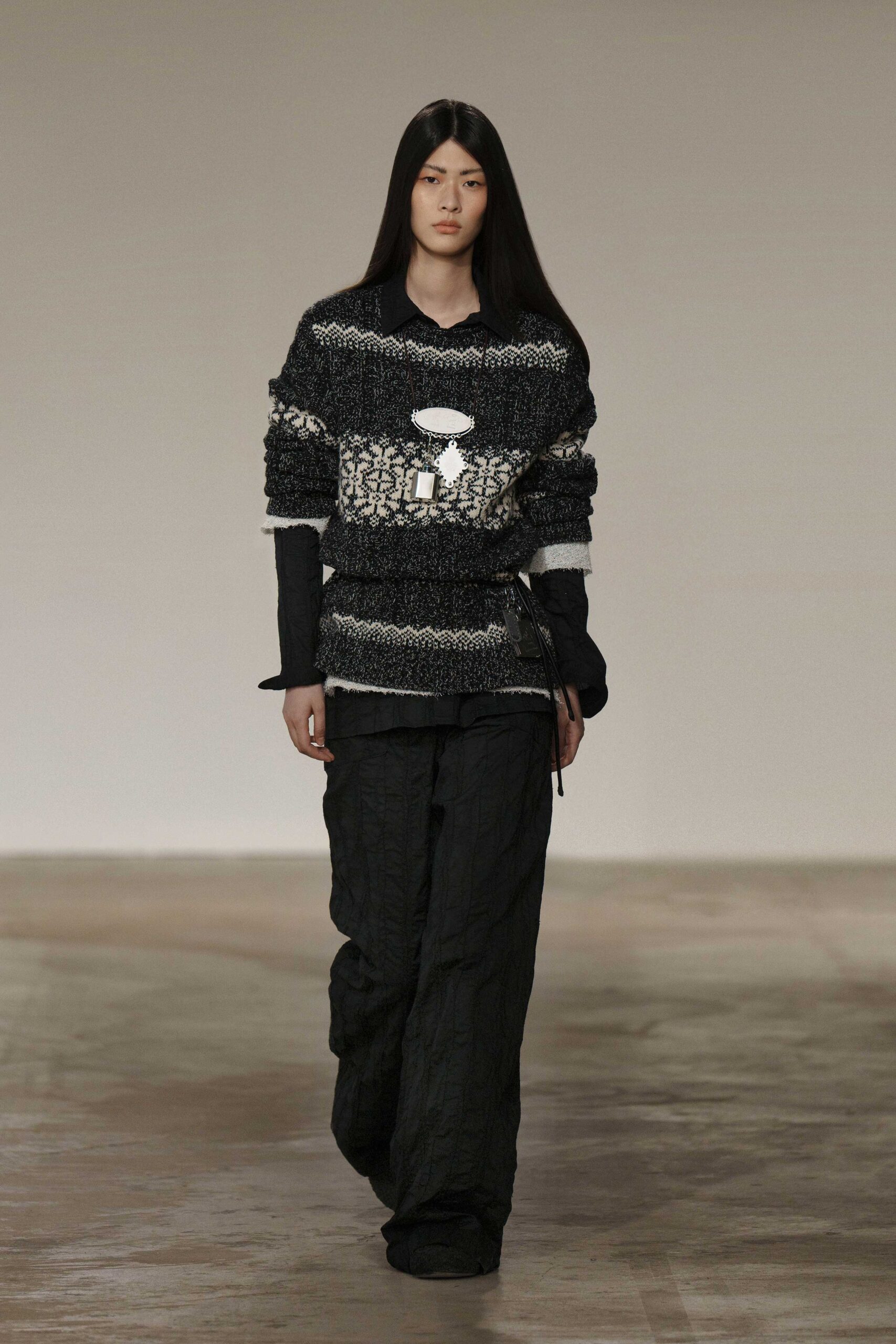 black and white embroidered top with relaxed pants