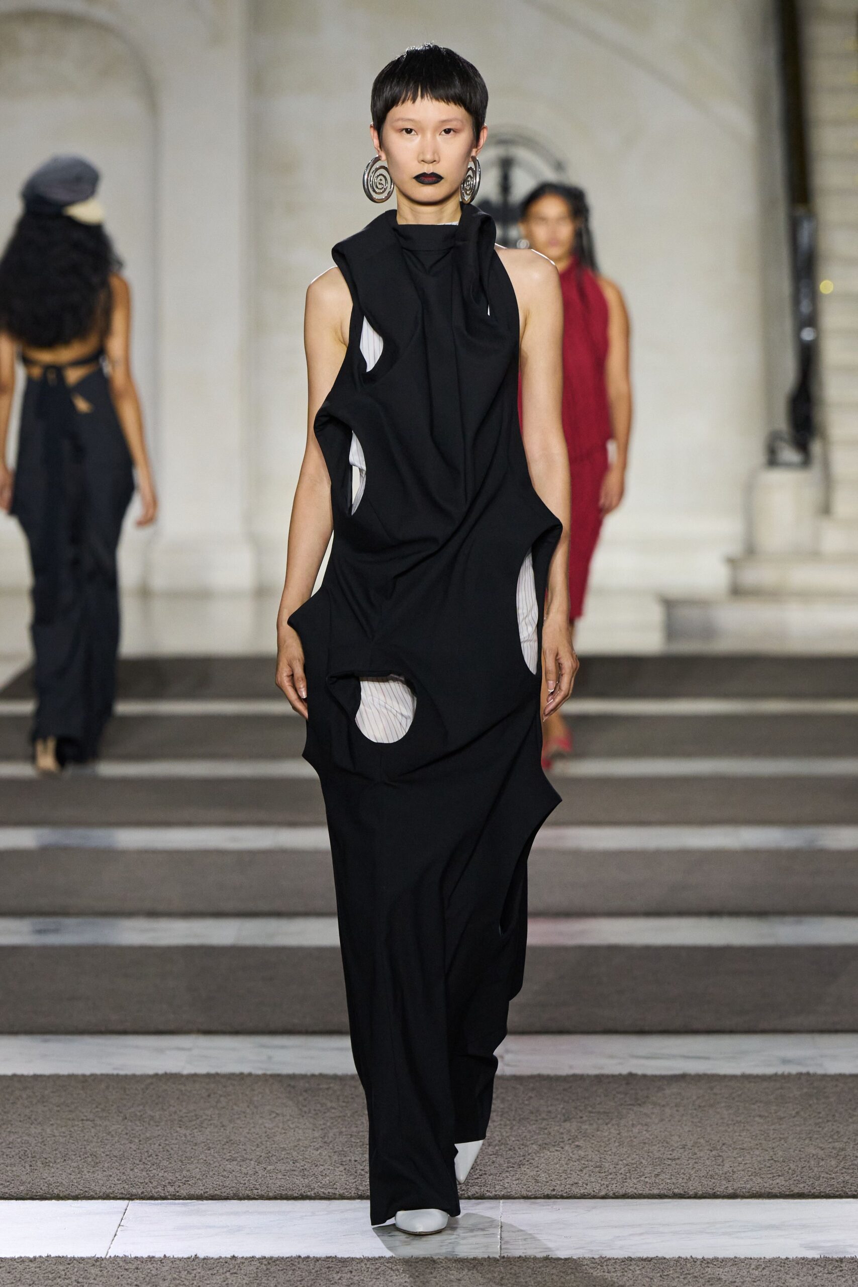 black fitted gown with cutouts