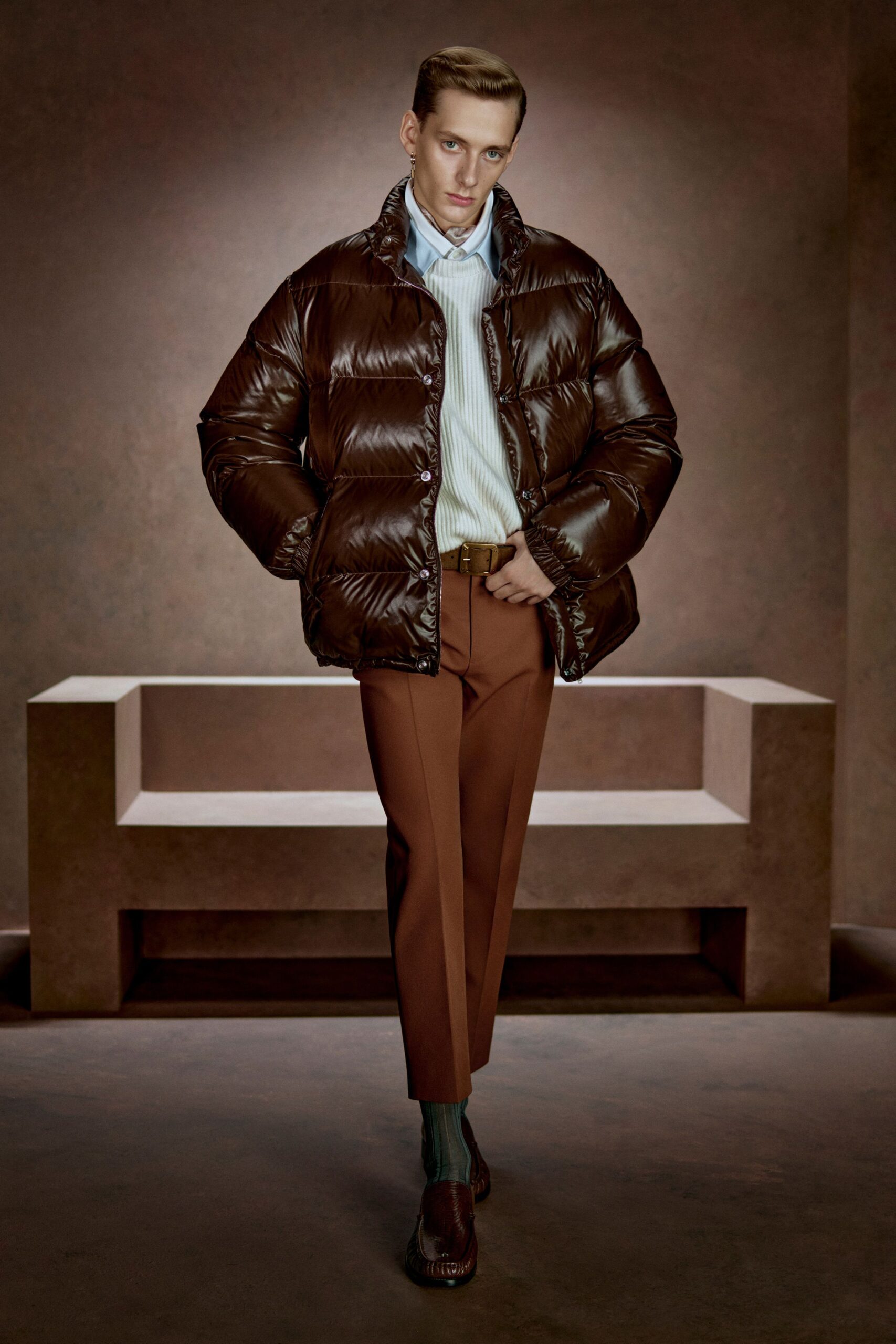 brown puffer jacket with tailored pants