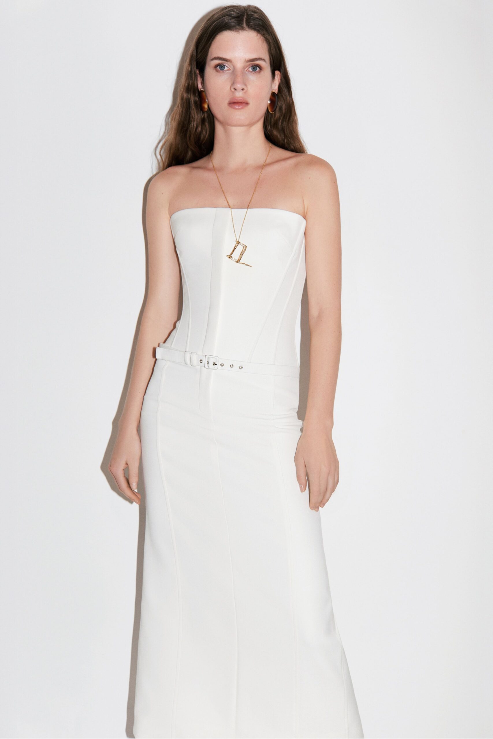 white fitted strapless gown