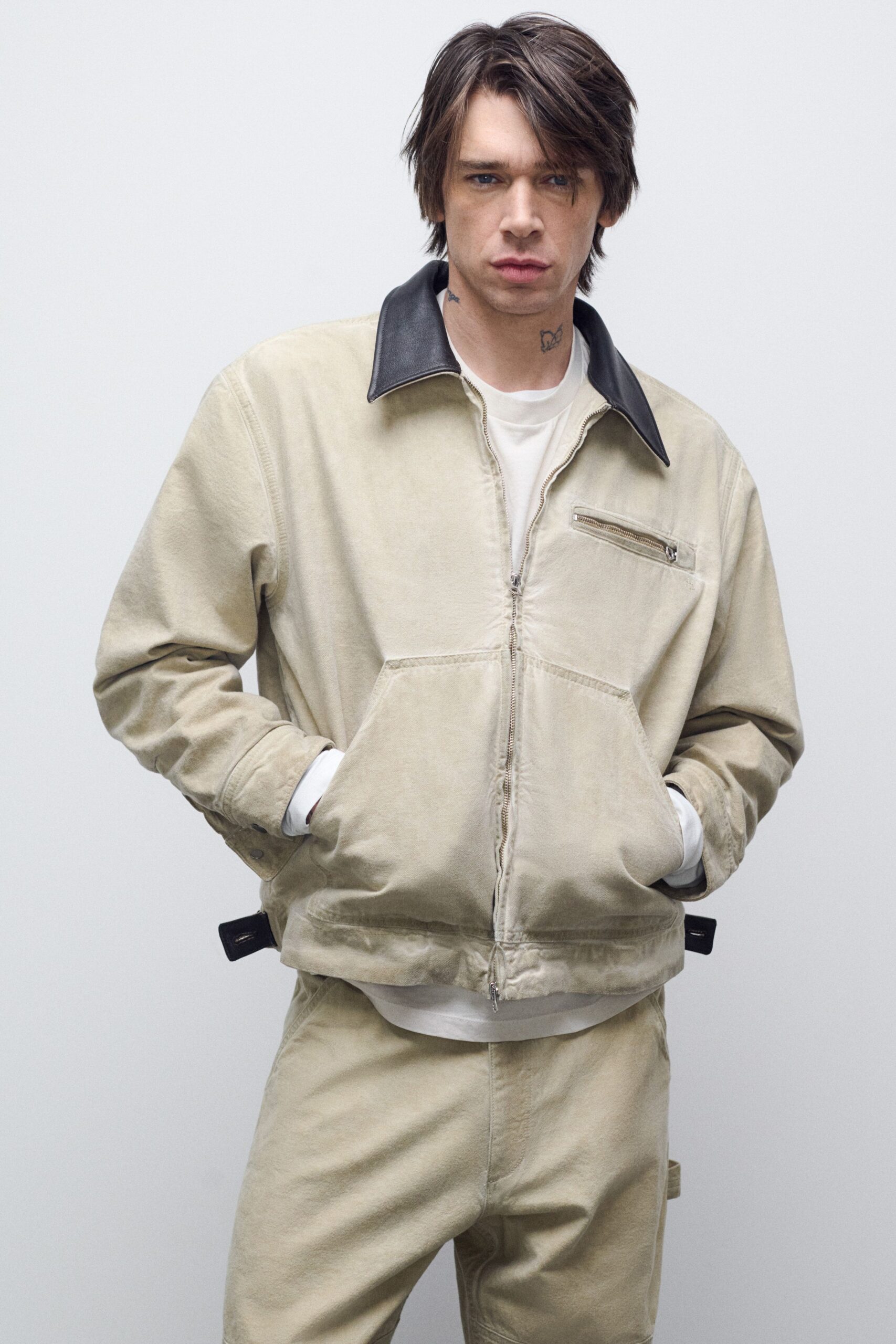 beige relaxed jacket with white shirt
