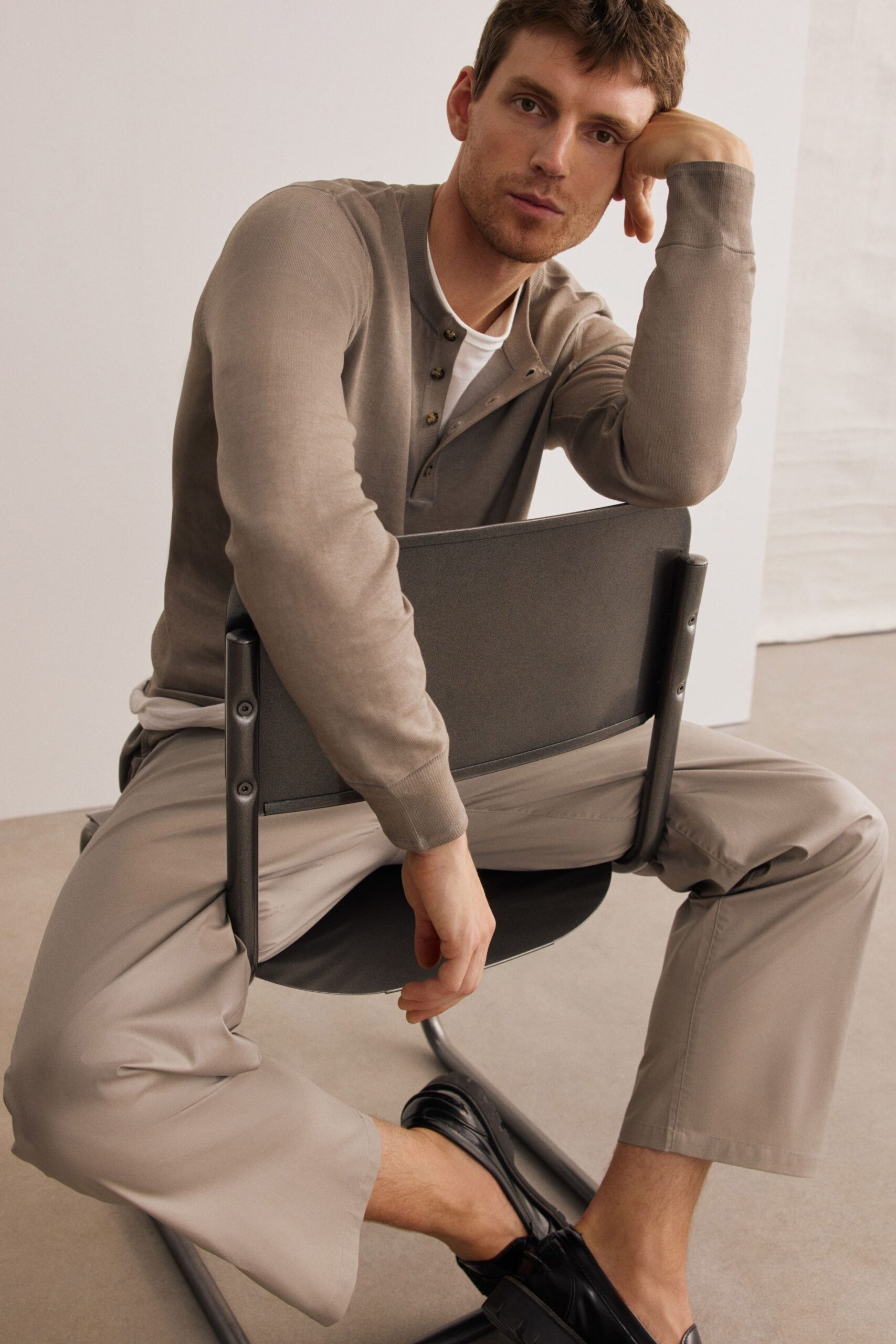 beige relaxed shirt gray pants