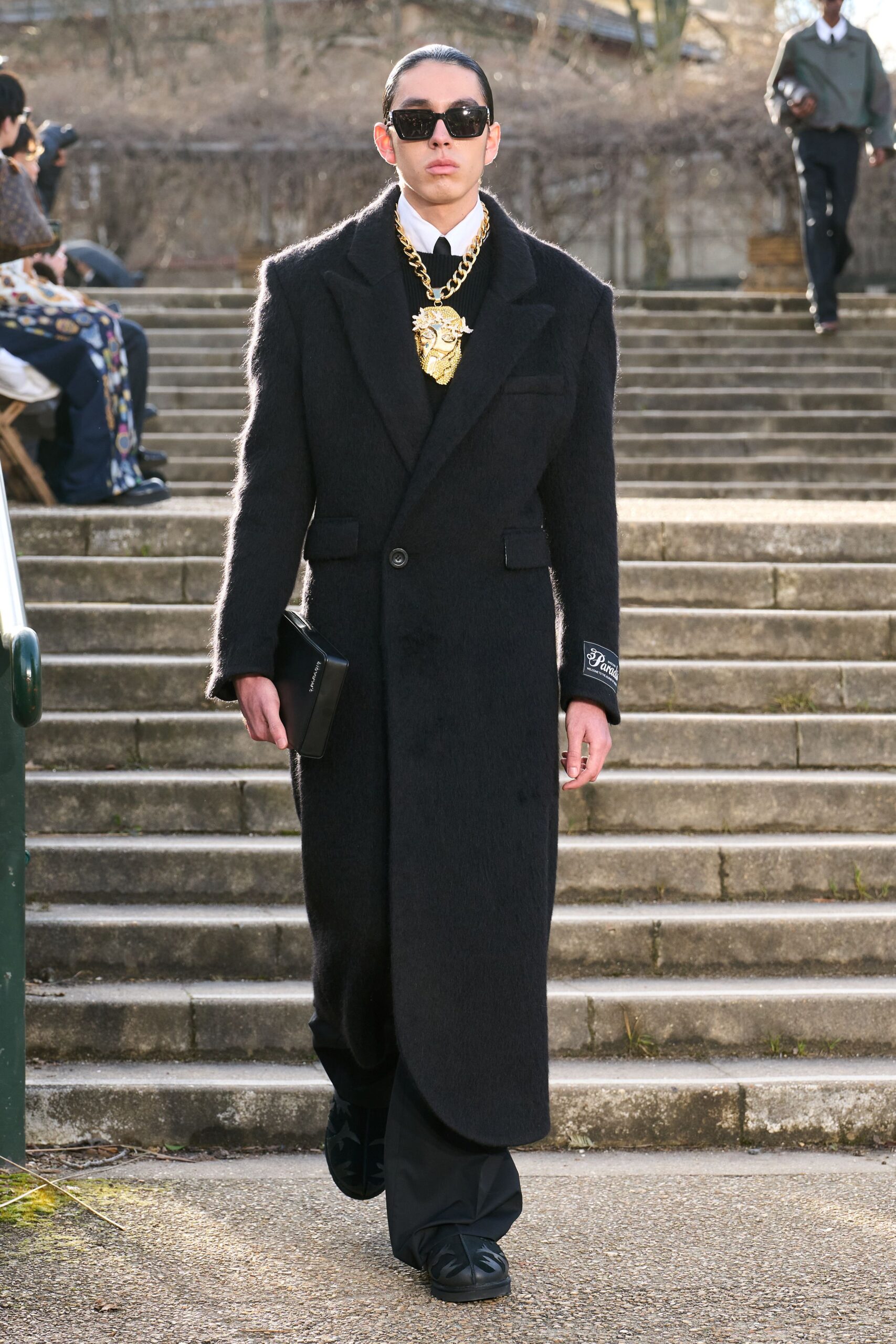 black wool coat with sunglasses