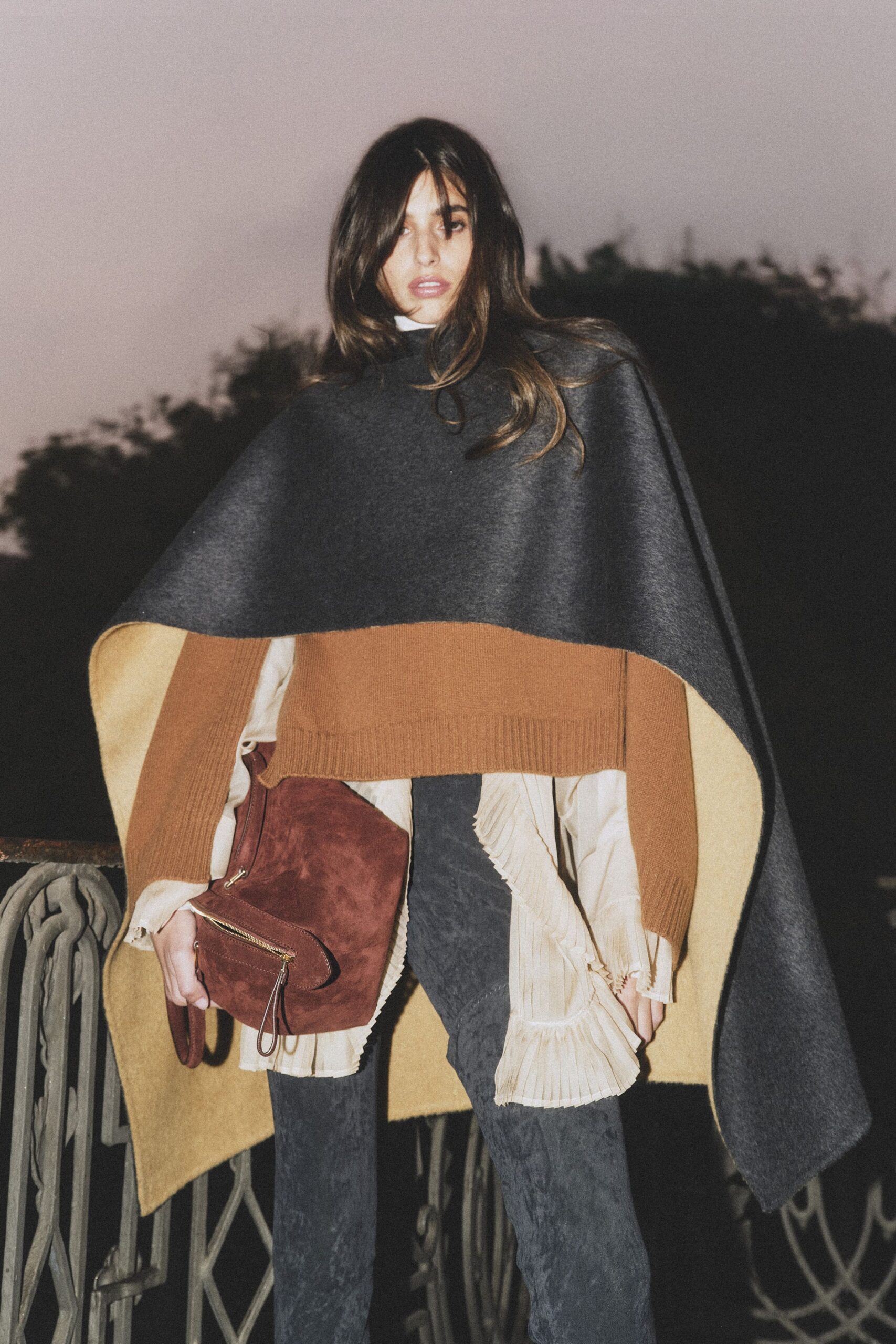 gray wool poncho with ruffled top