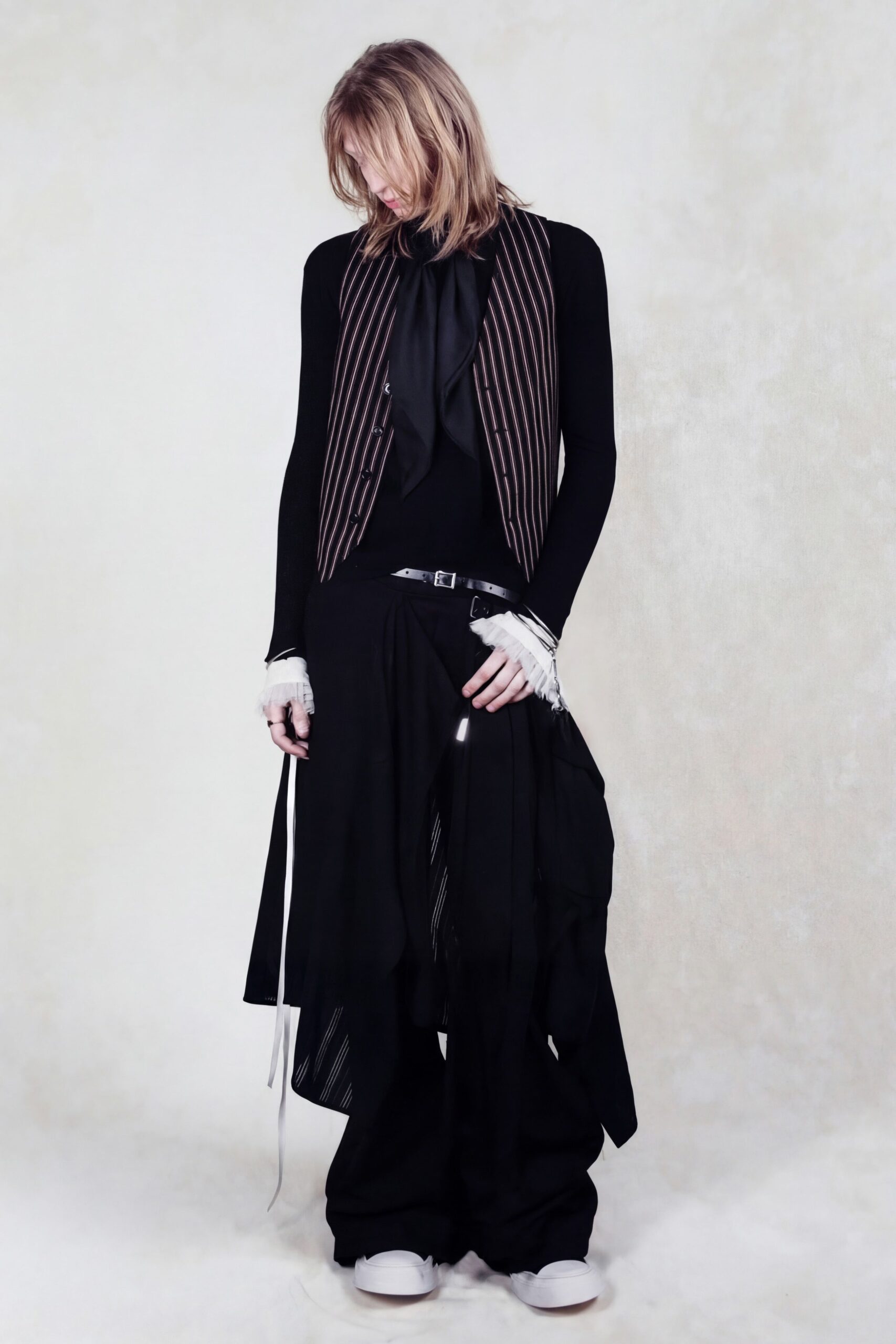 black long-sleeve collared fitted striped vest