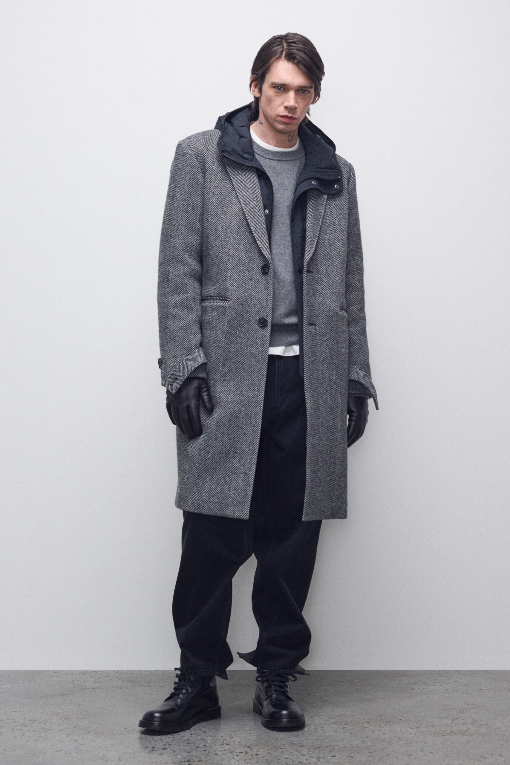 gray wool coat with black boots
