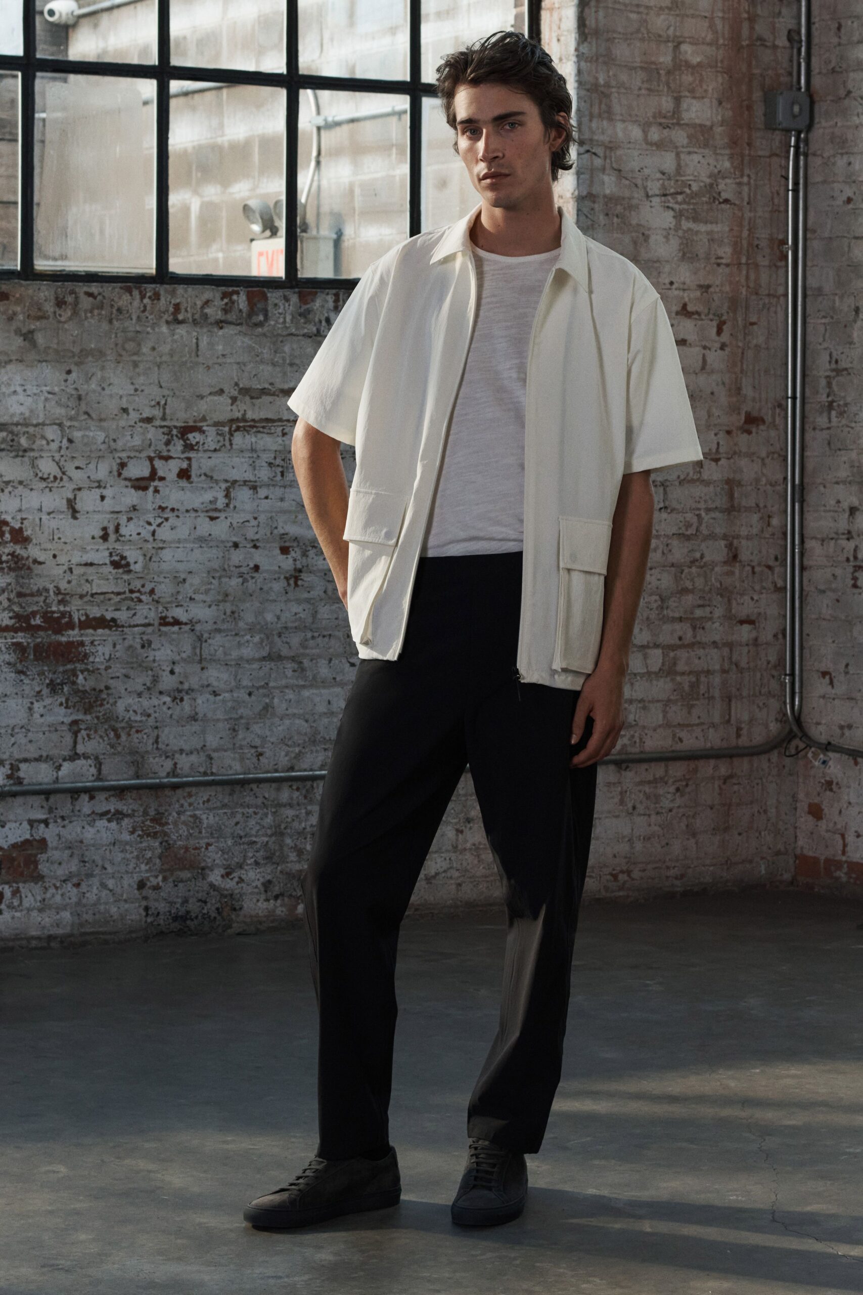 white relaxed jacket with black pants