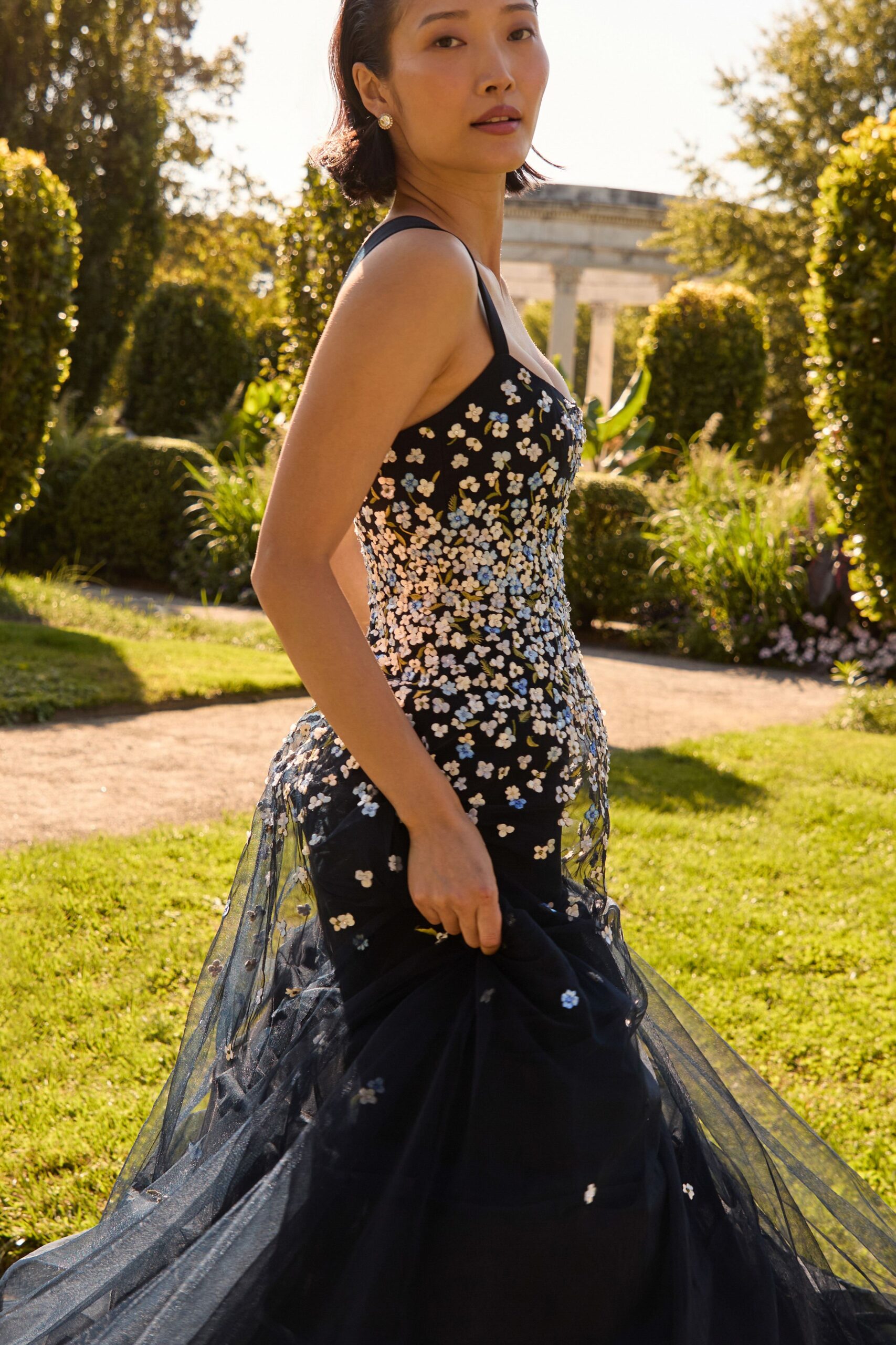 black embroidered sleeveless gown