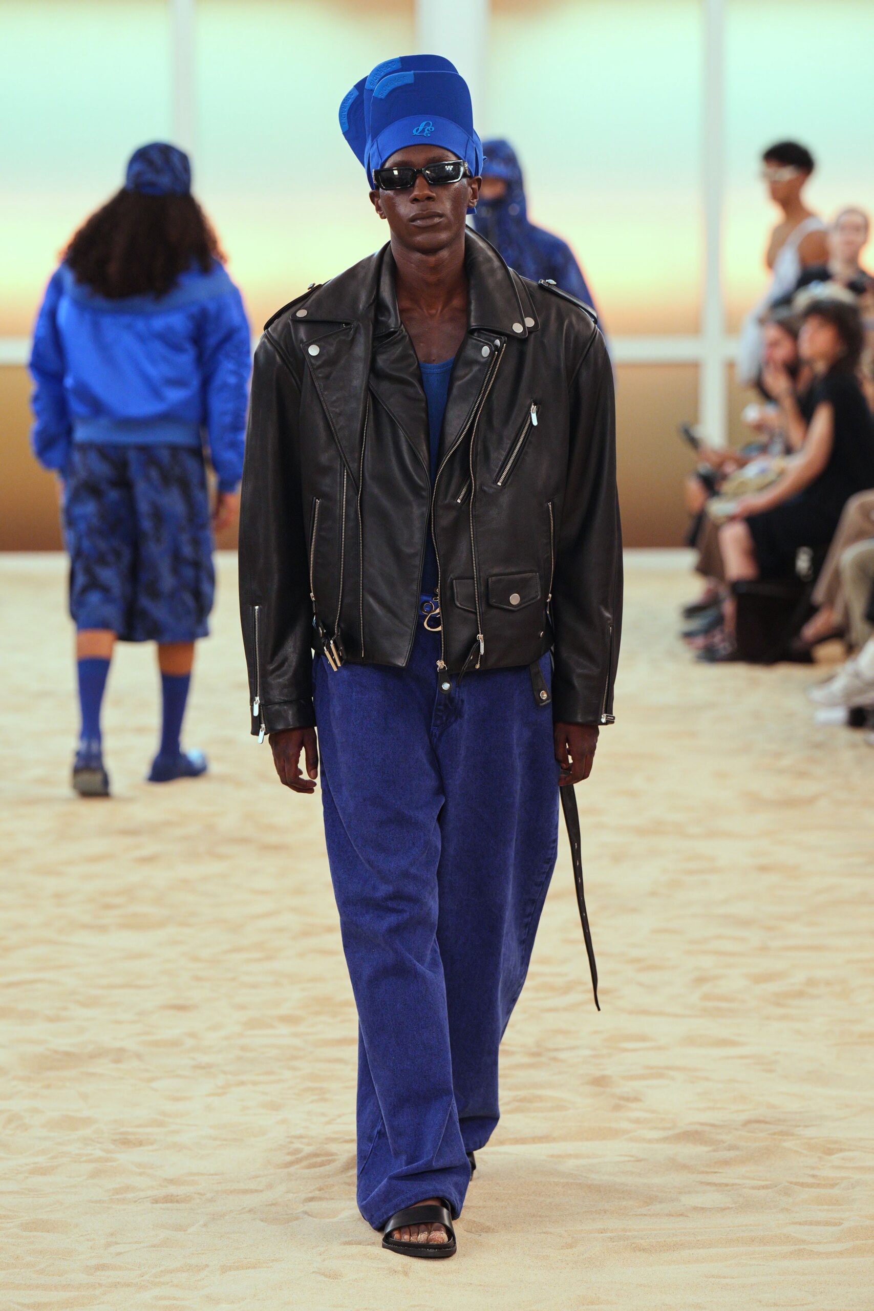 black leather jacket blue top
