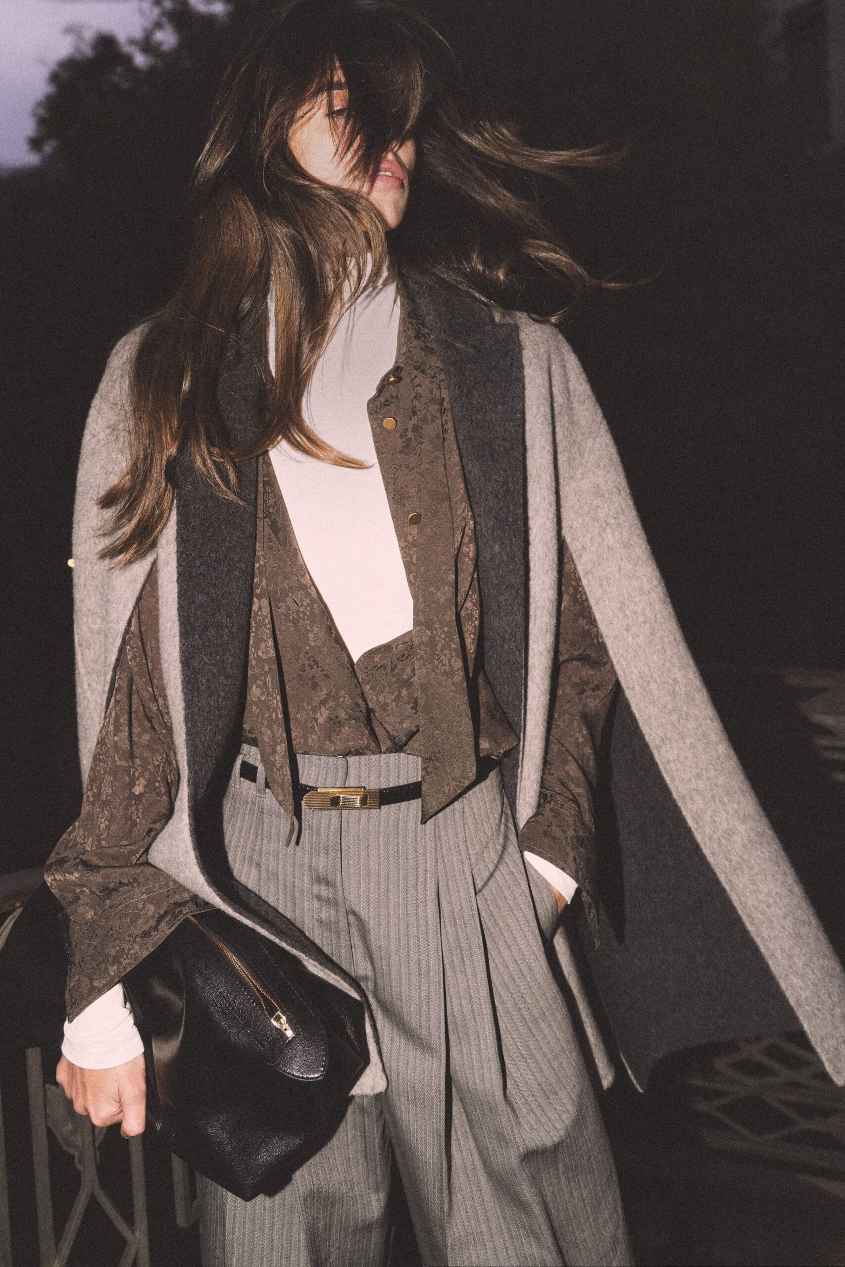gray wool cape with blouse and tailored pants