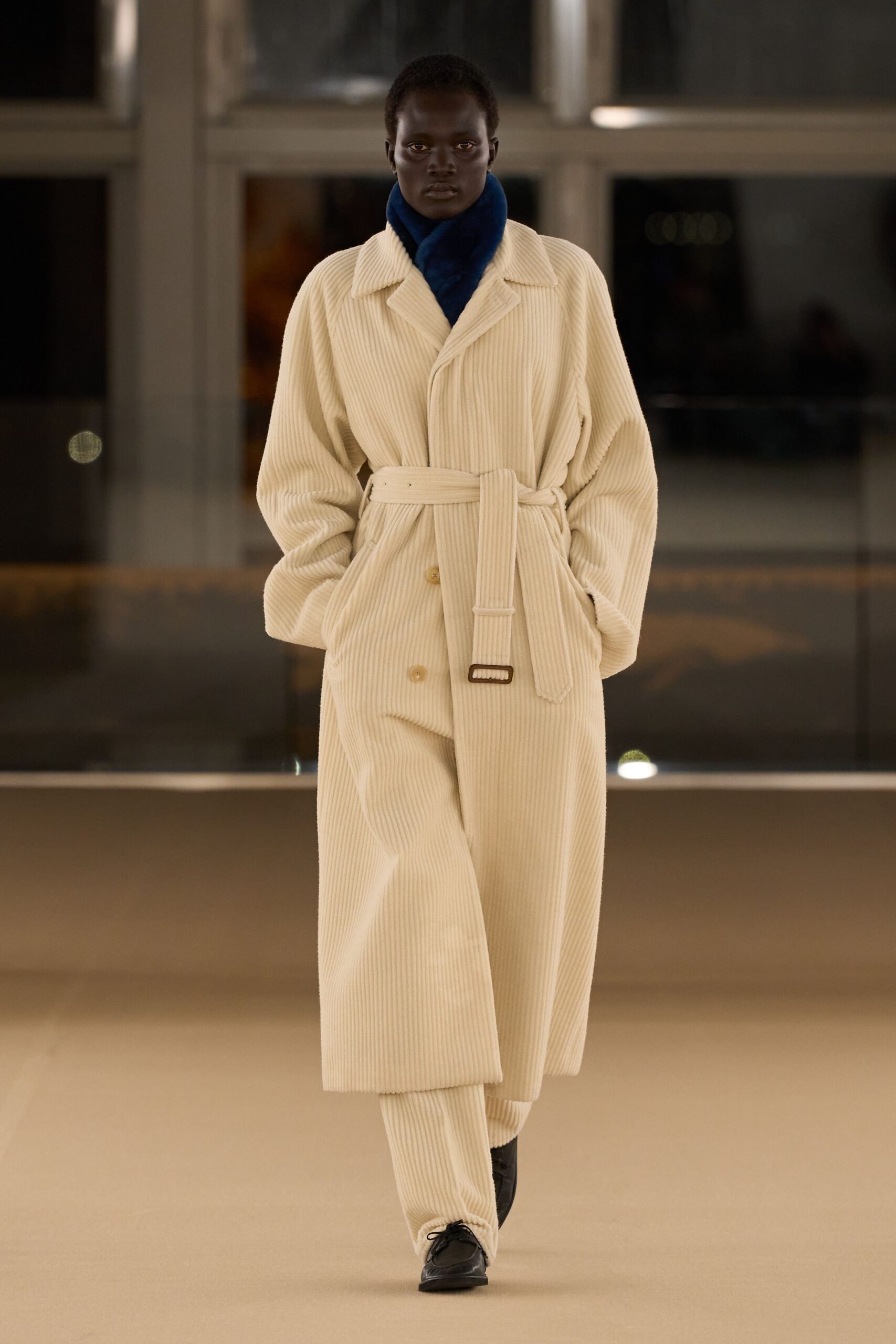 beige relaxed coat with blue scarf