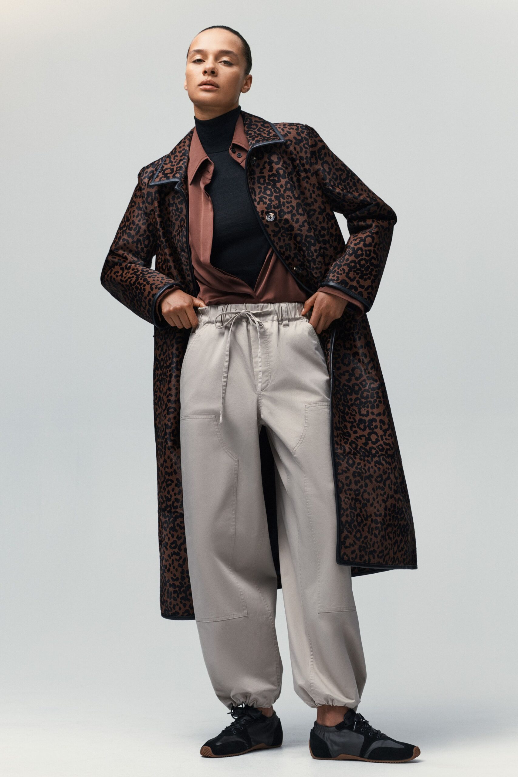 brown animal-print coat with relaxed pants