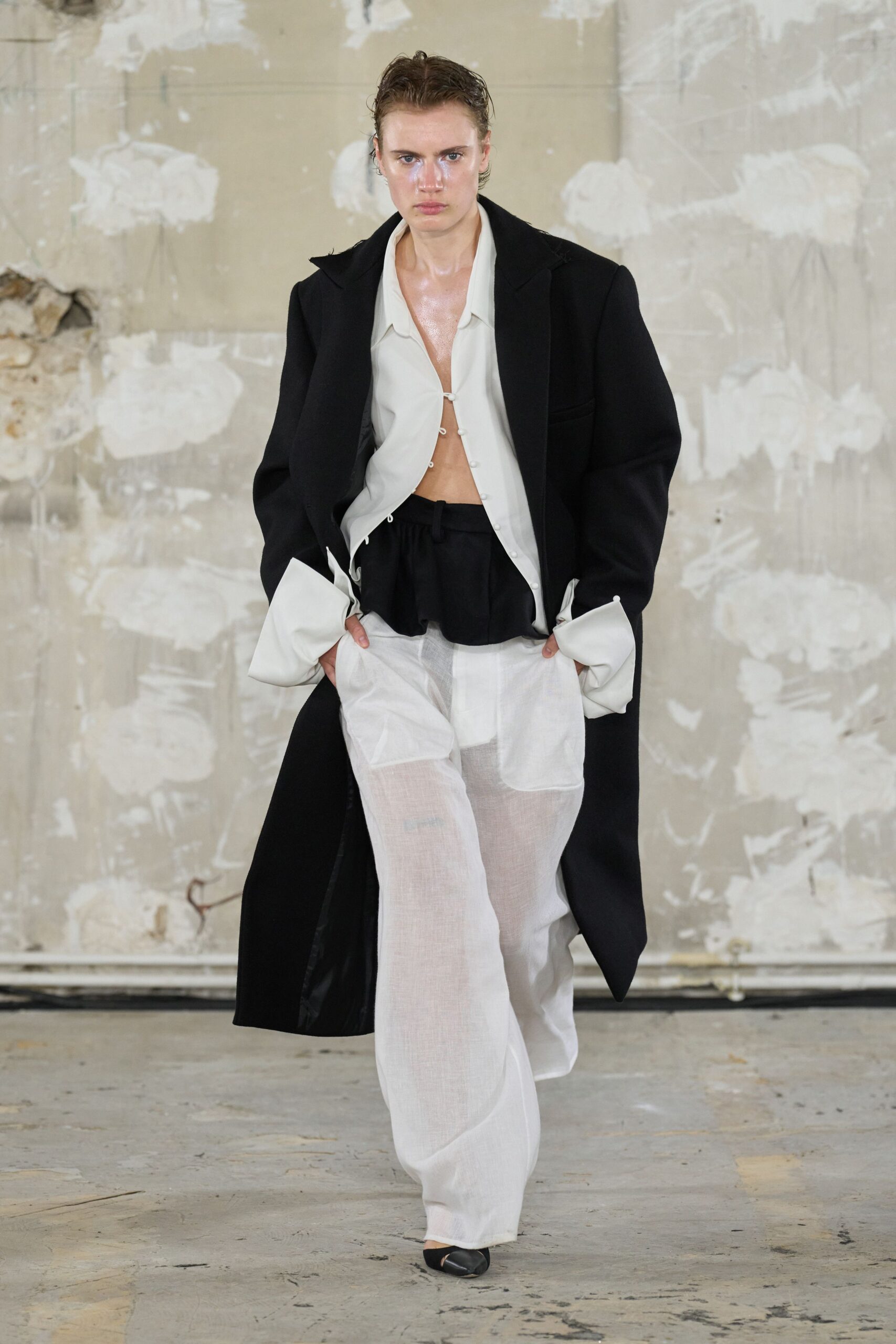 black long-sleeve collared relaxed coat