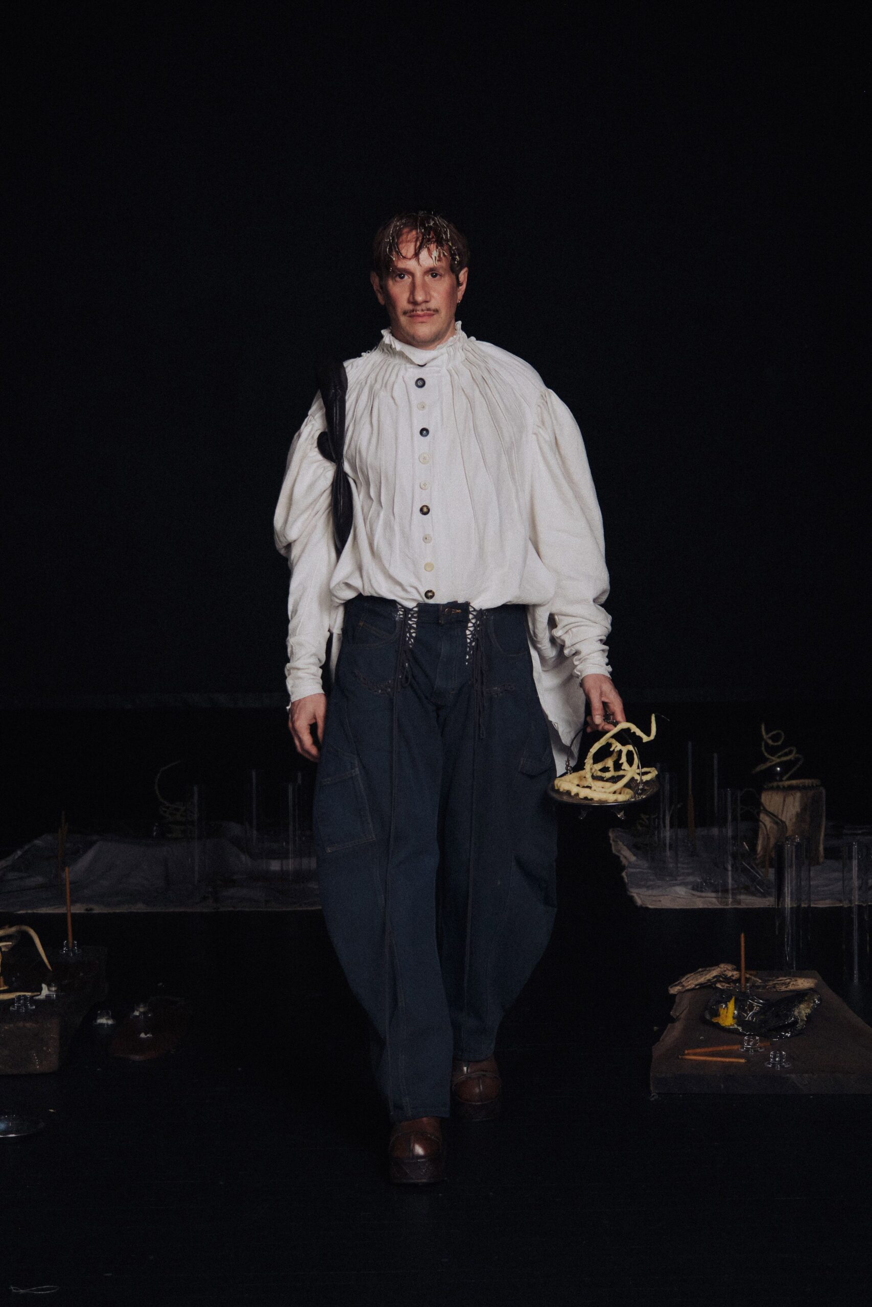 white relaxed shirt with blue pants