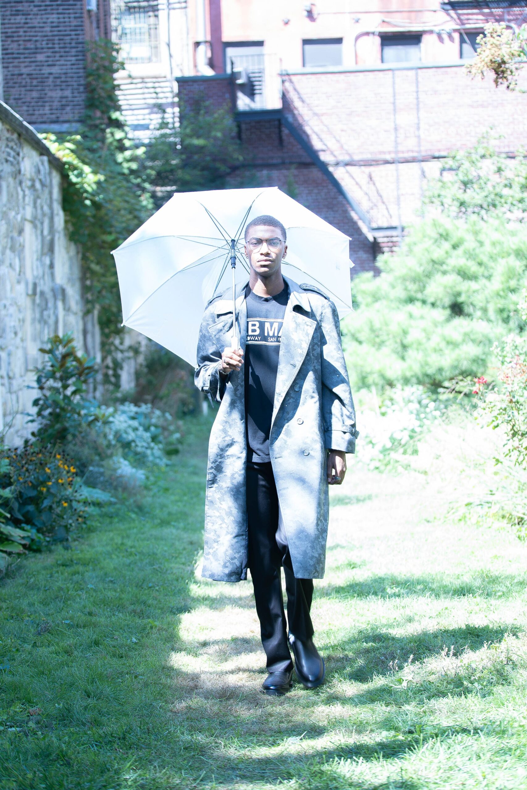 gray coat black t-shirt black pants