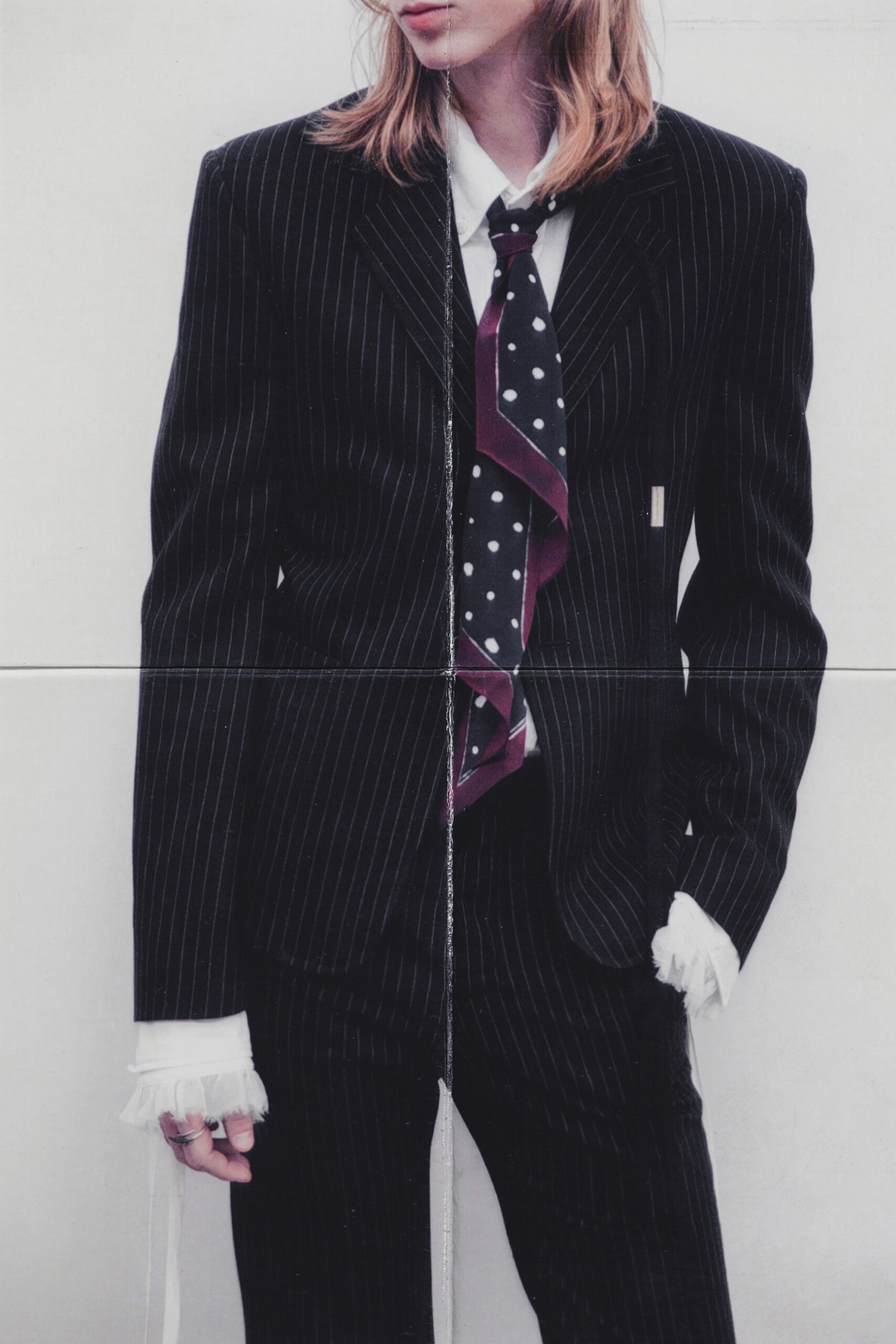 black tailored suit with tie