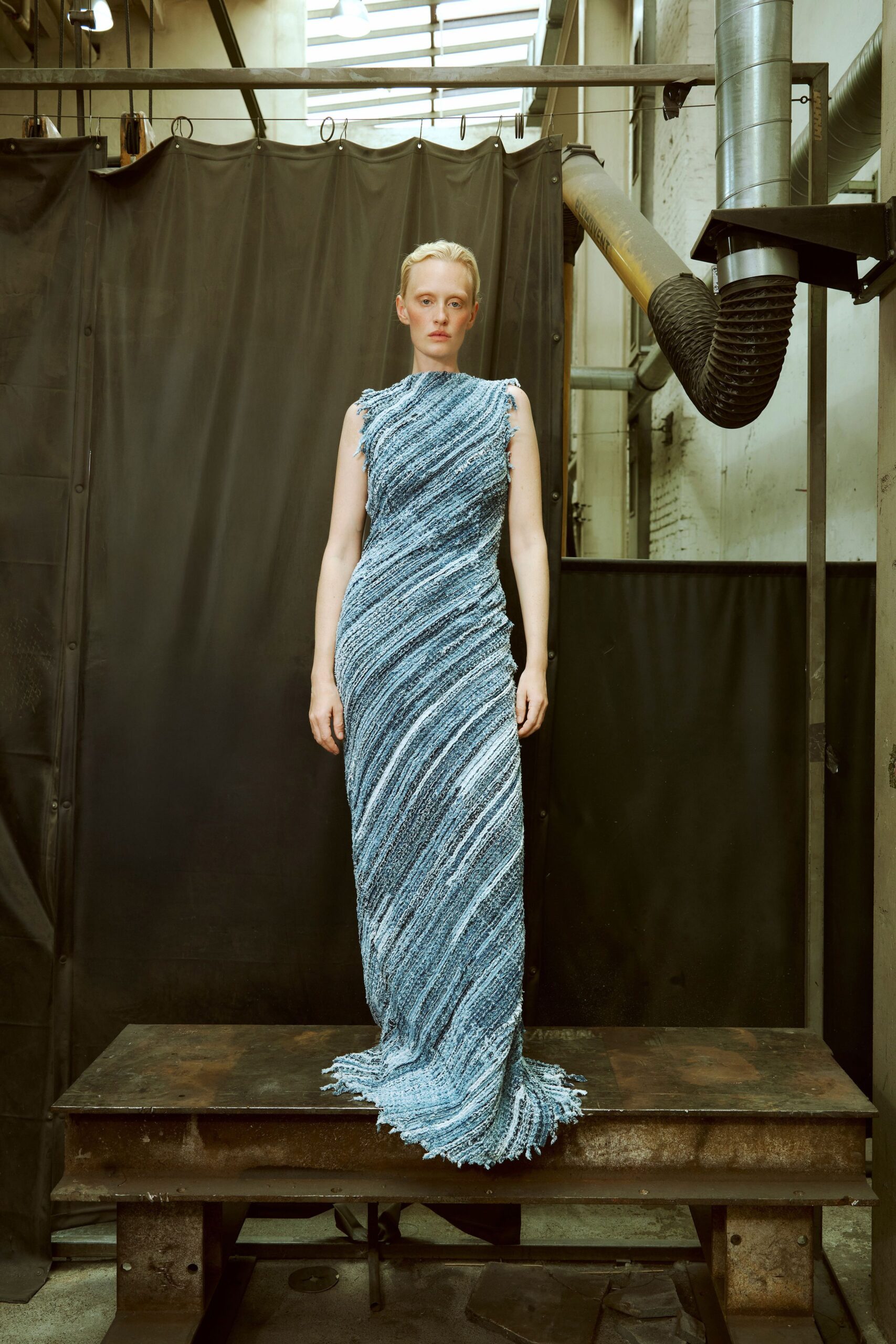 blue silk sleeveless gown
