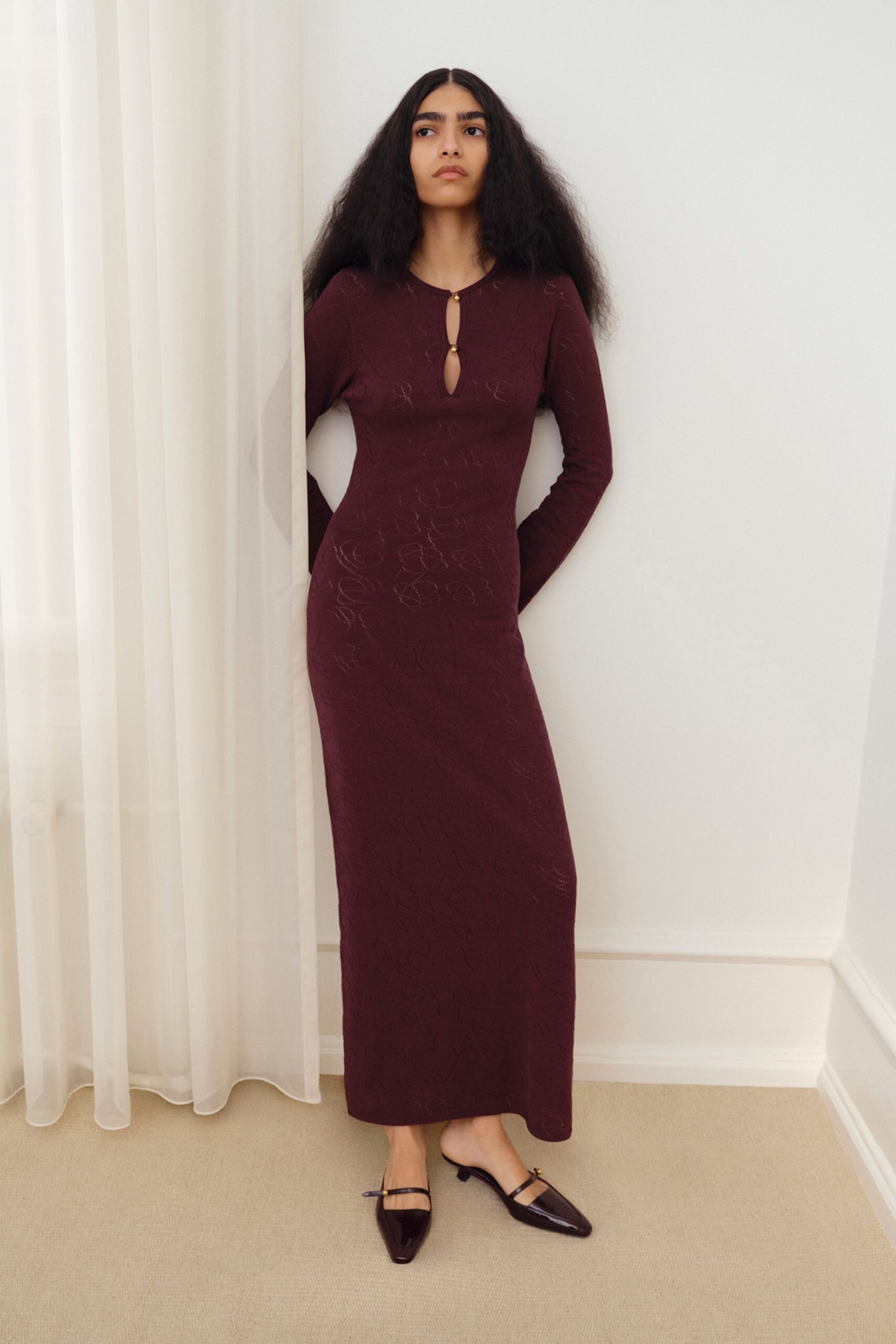 maroon cotton long-sleeve v-neck fitted textured maxi gown