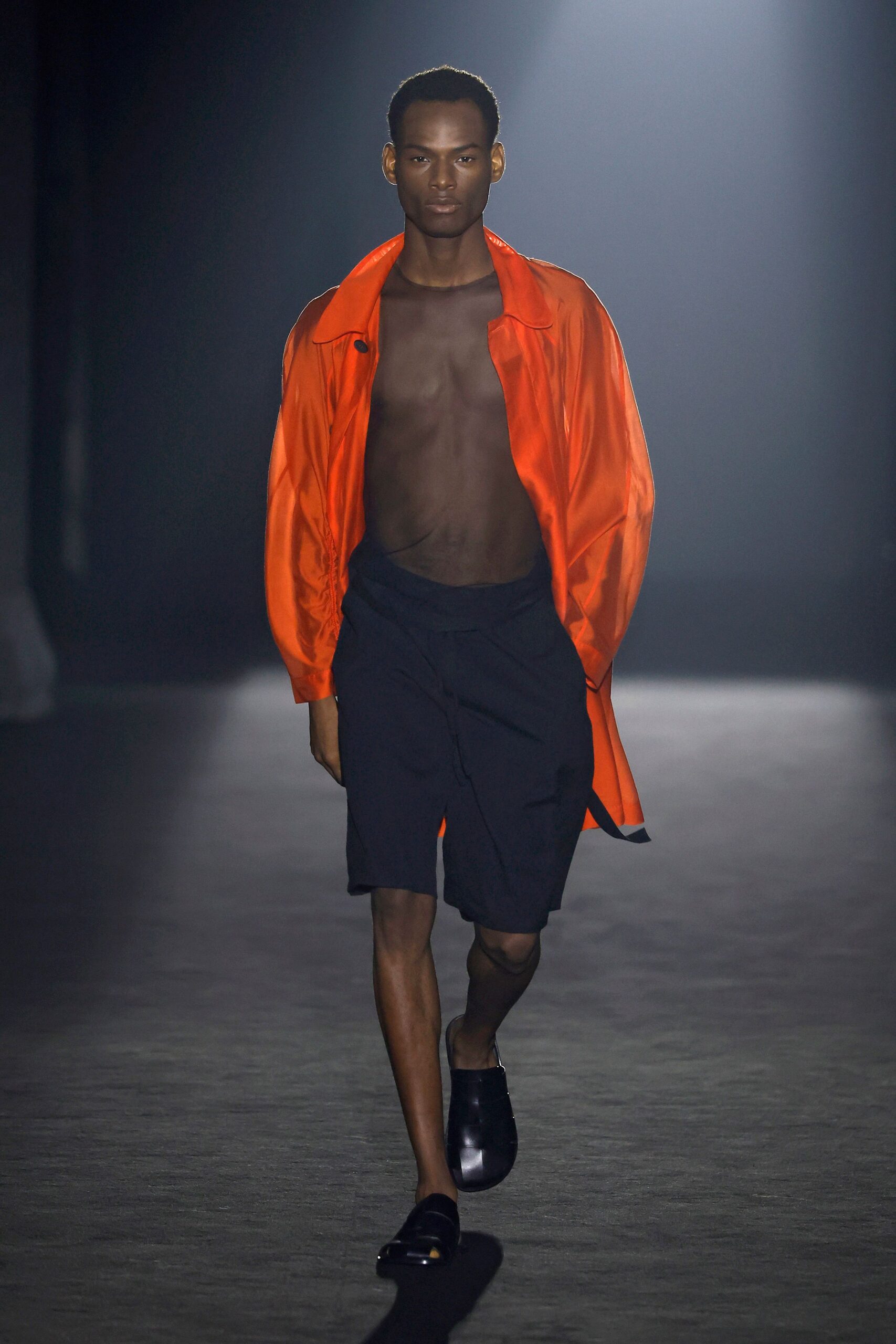 orange silk shirt black shorts