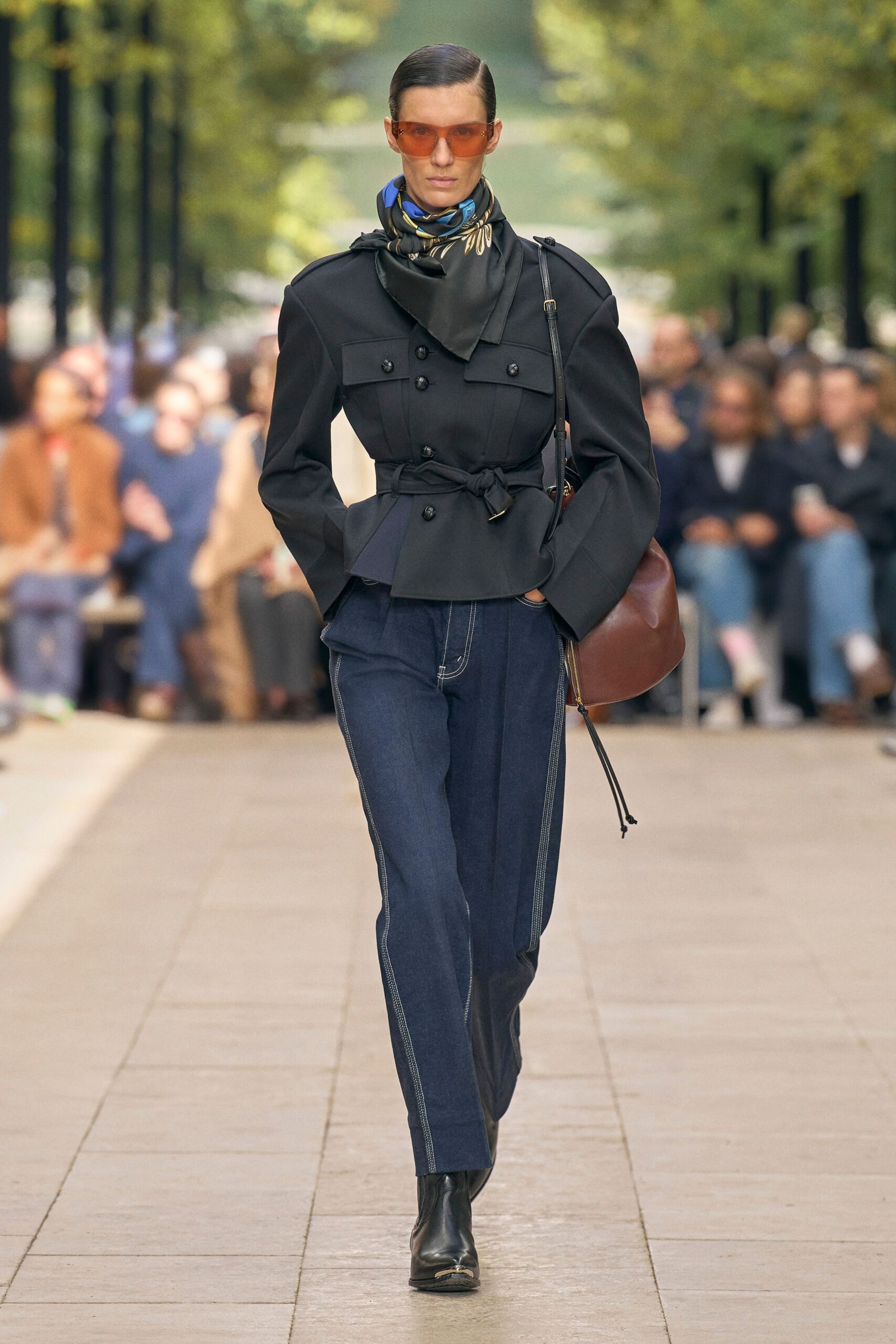 black structured jacket with denim pants