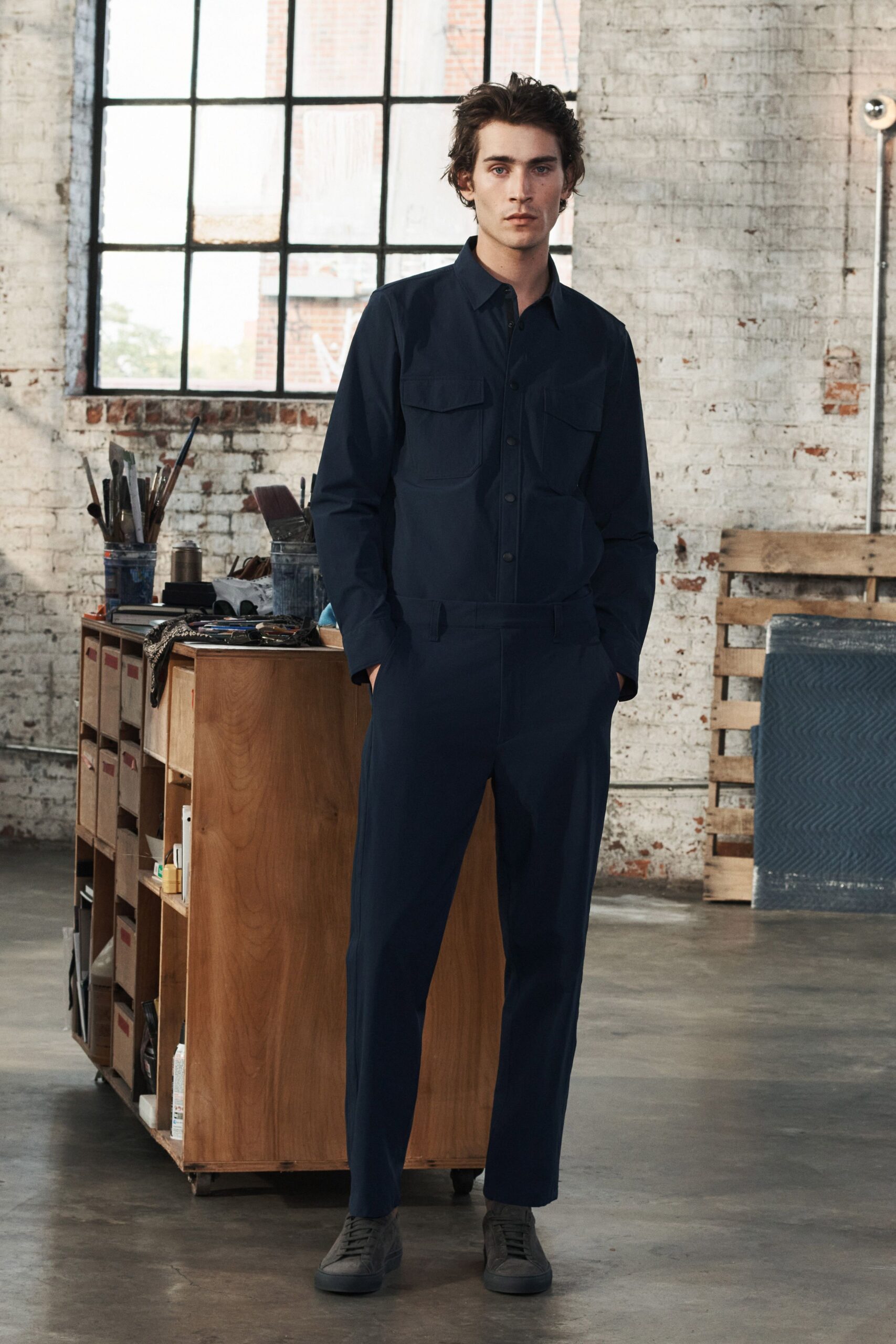 blue cotton shirt and tailored pants