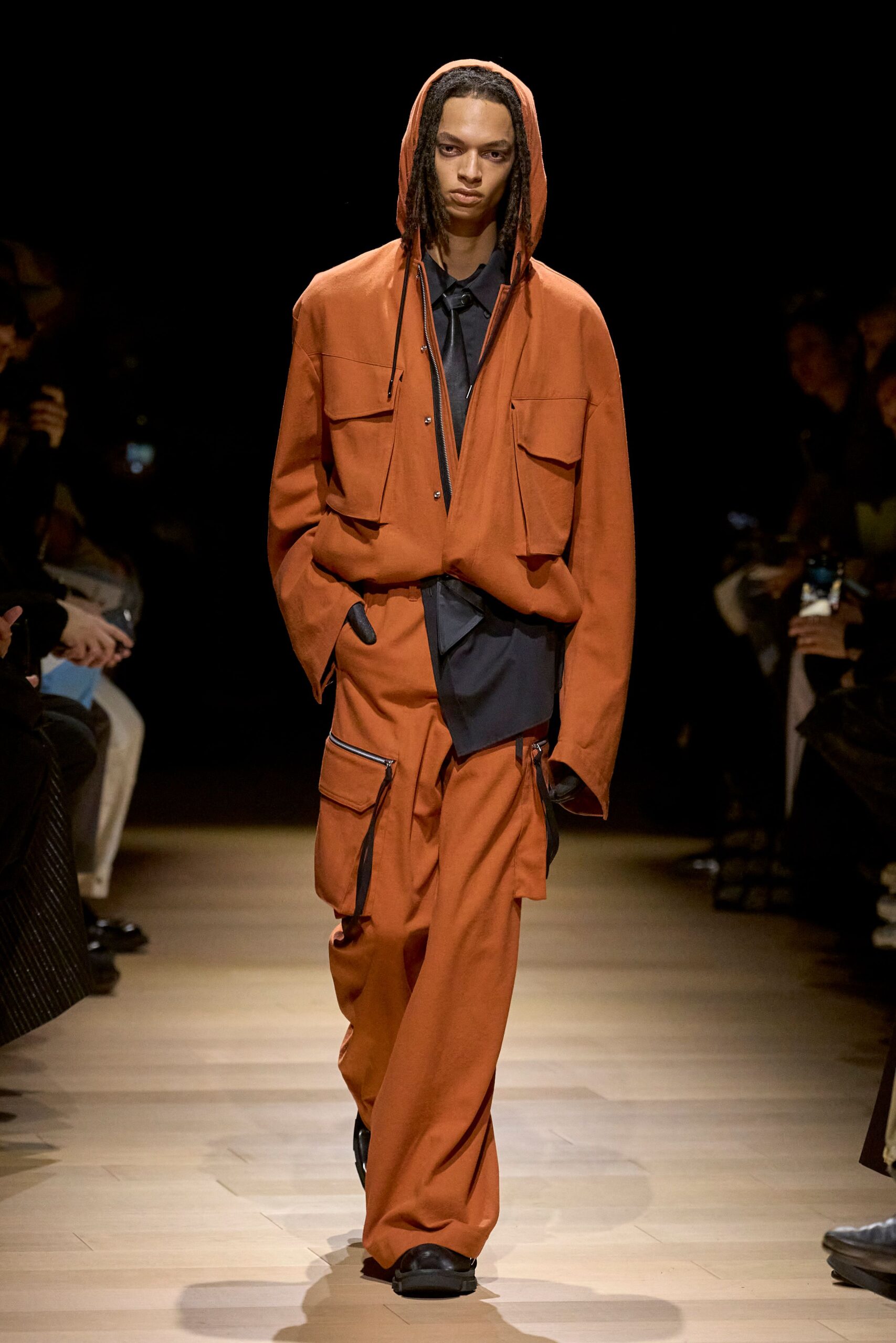 orange relaxed jacket with black shirt