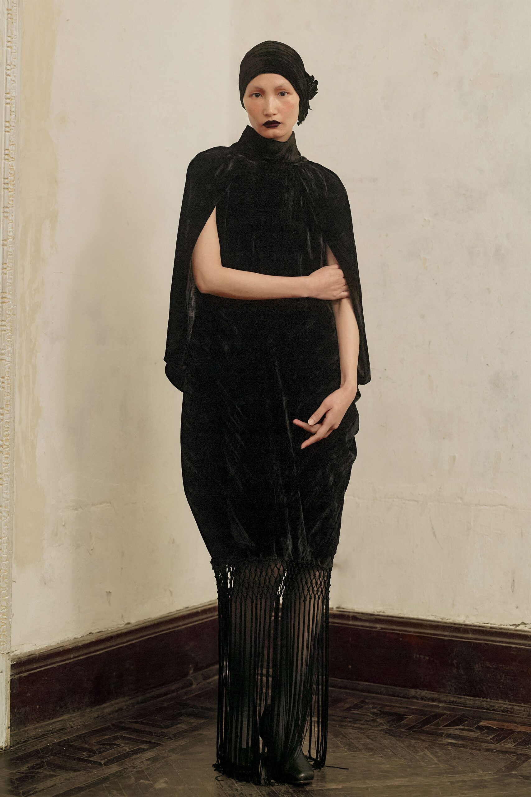 black velvet sleeveless fitted cape