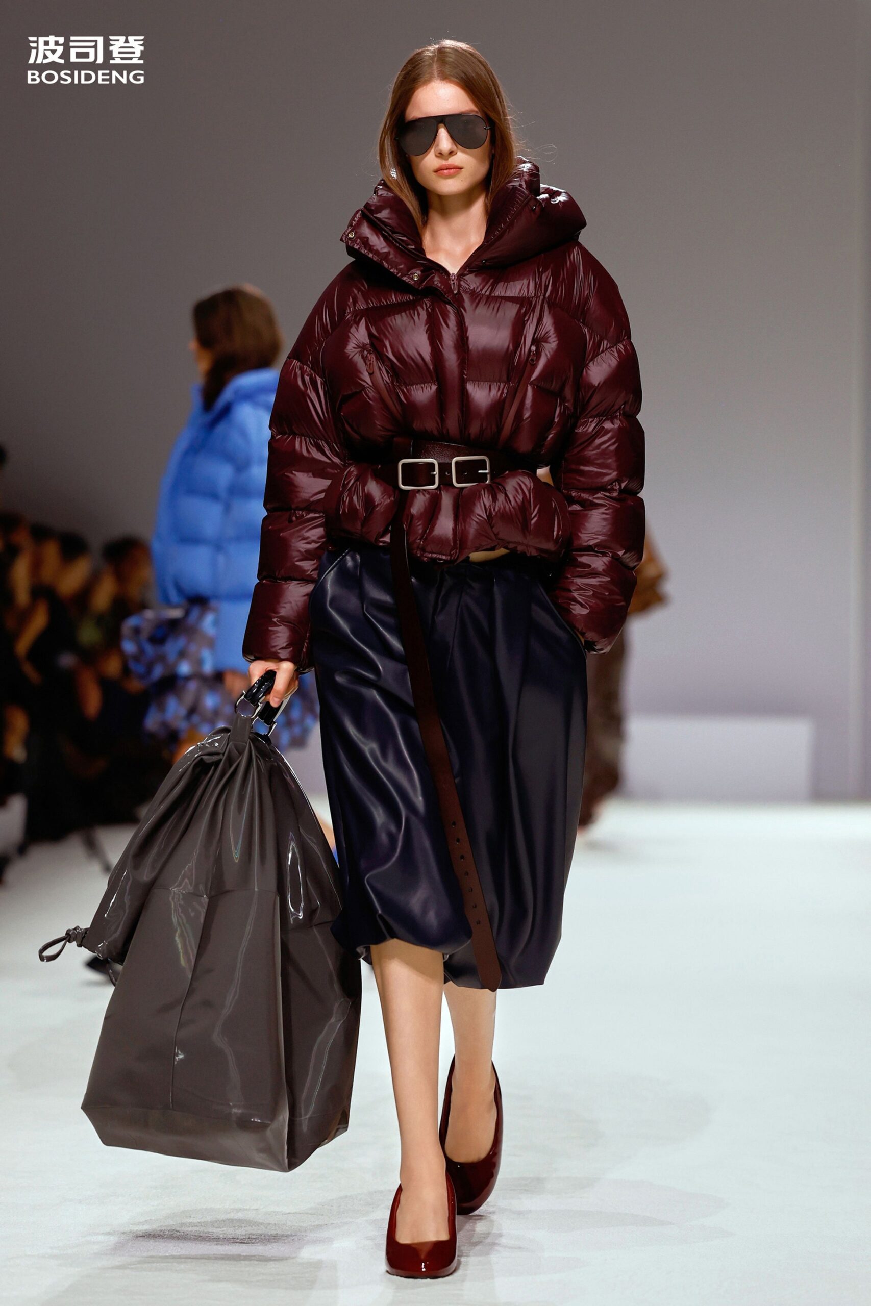maroon vinyl long-sleeve collared fitted zippered padded jacket