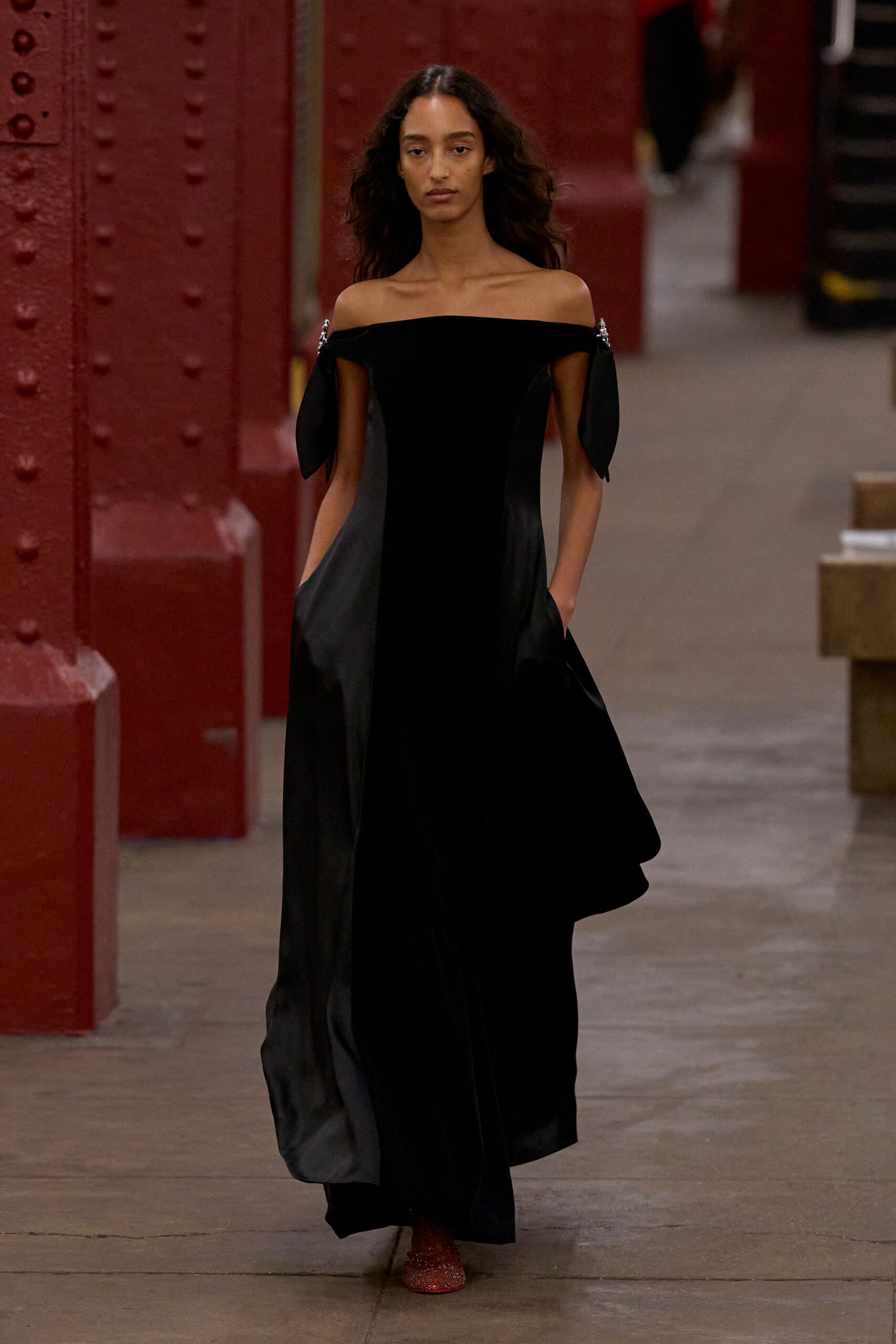black silk off-shoulder fitted a-line pockets flowing gown