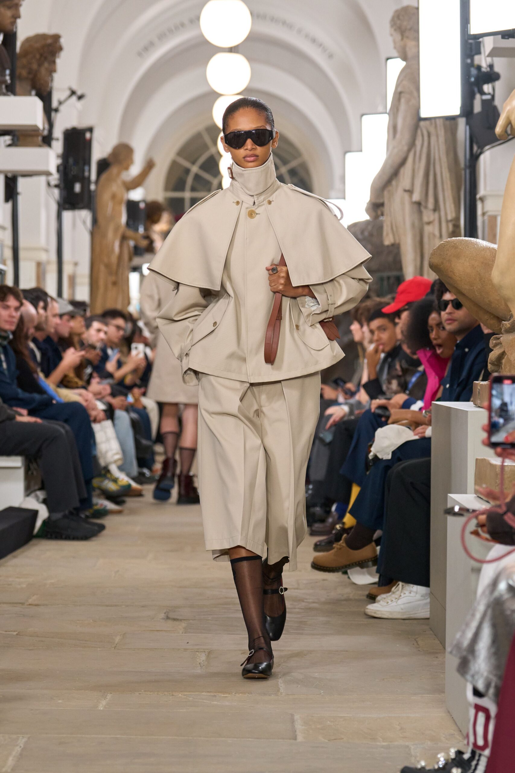 beige fitted coat and skirt