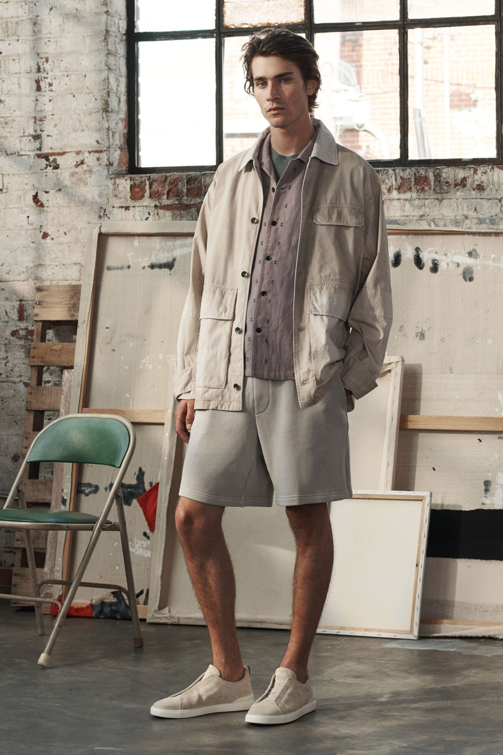 beige relaxed jacket with gray shorts