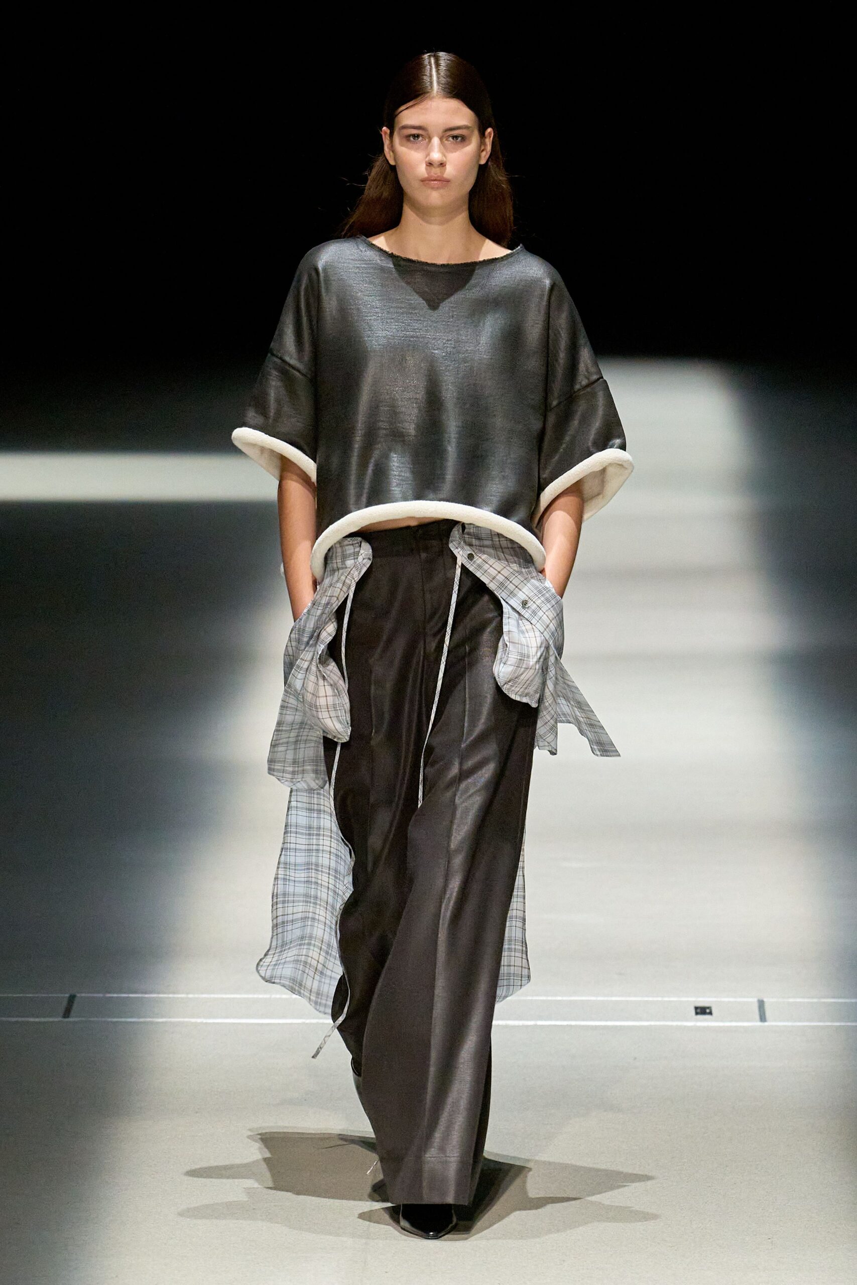 black silk cropped top with gray pants