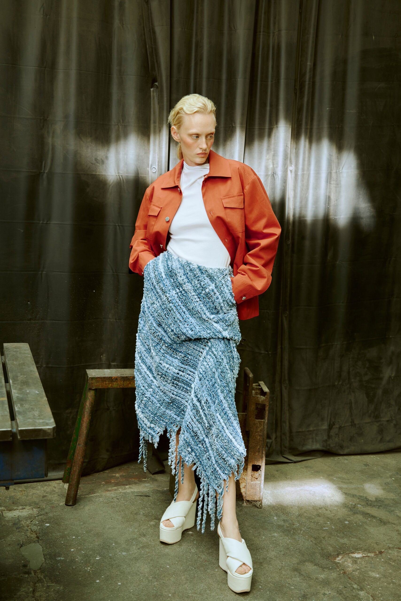 red jacket white top blue skirt