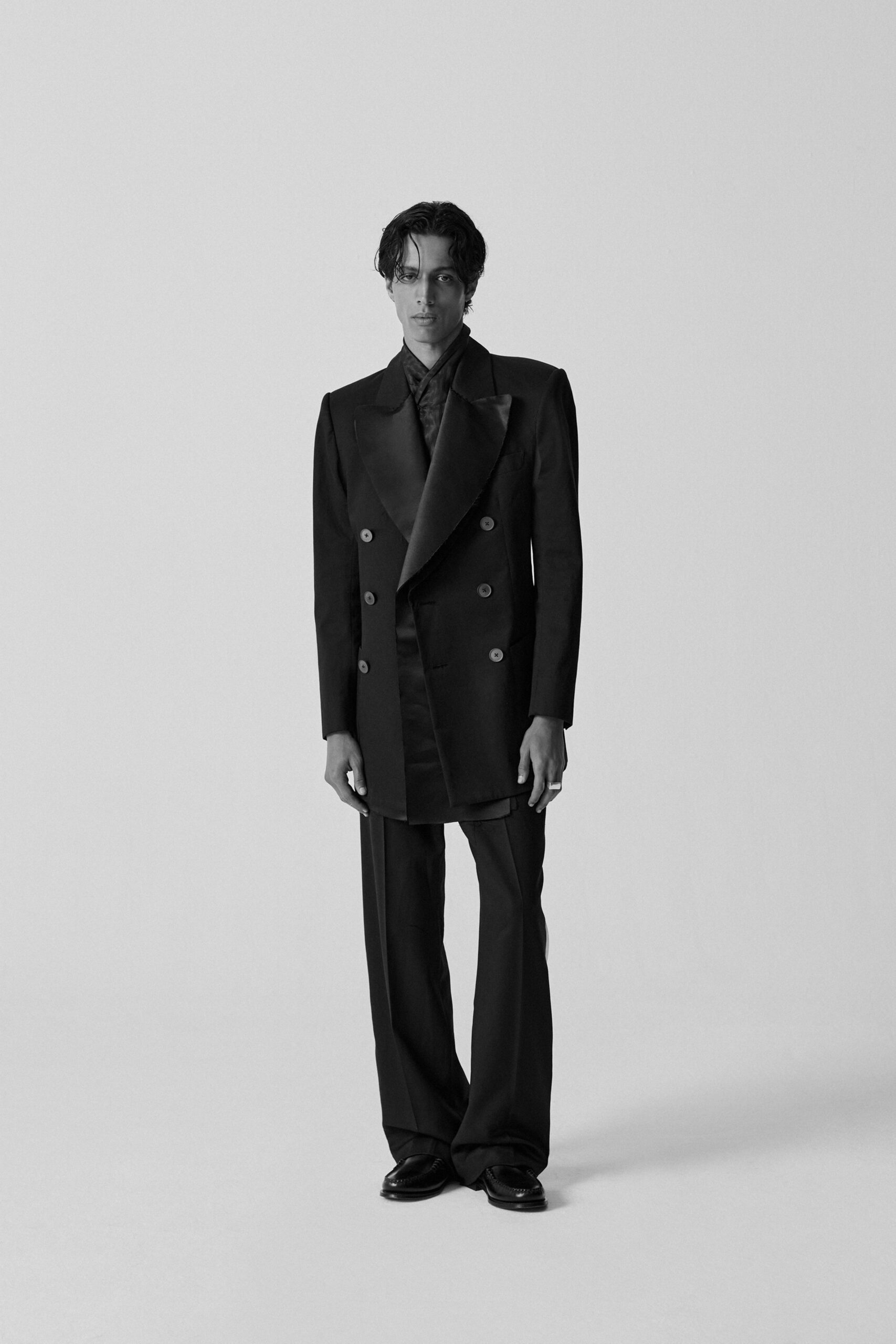 black silk long-sleeve collared structured suit