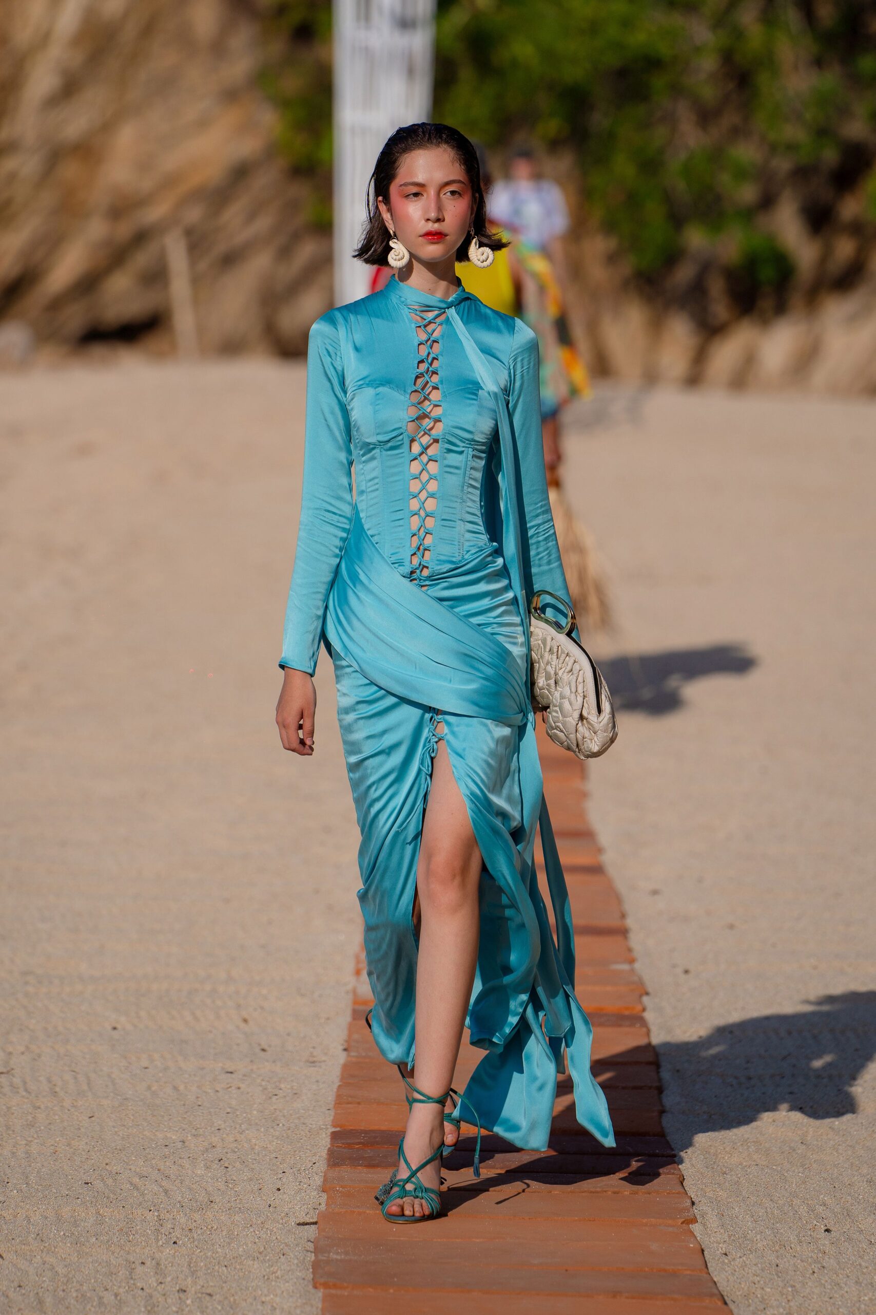 blue silk long-sleeve v-neck fitted ruched flowing dress