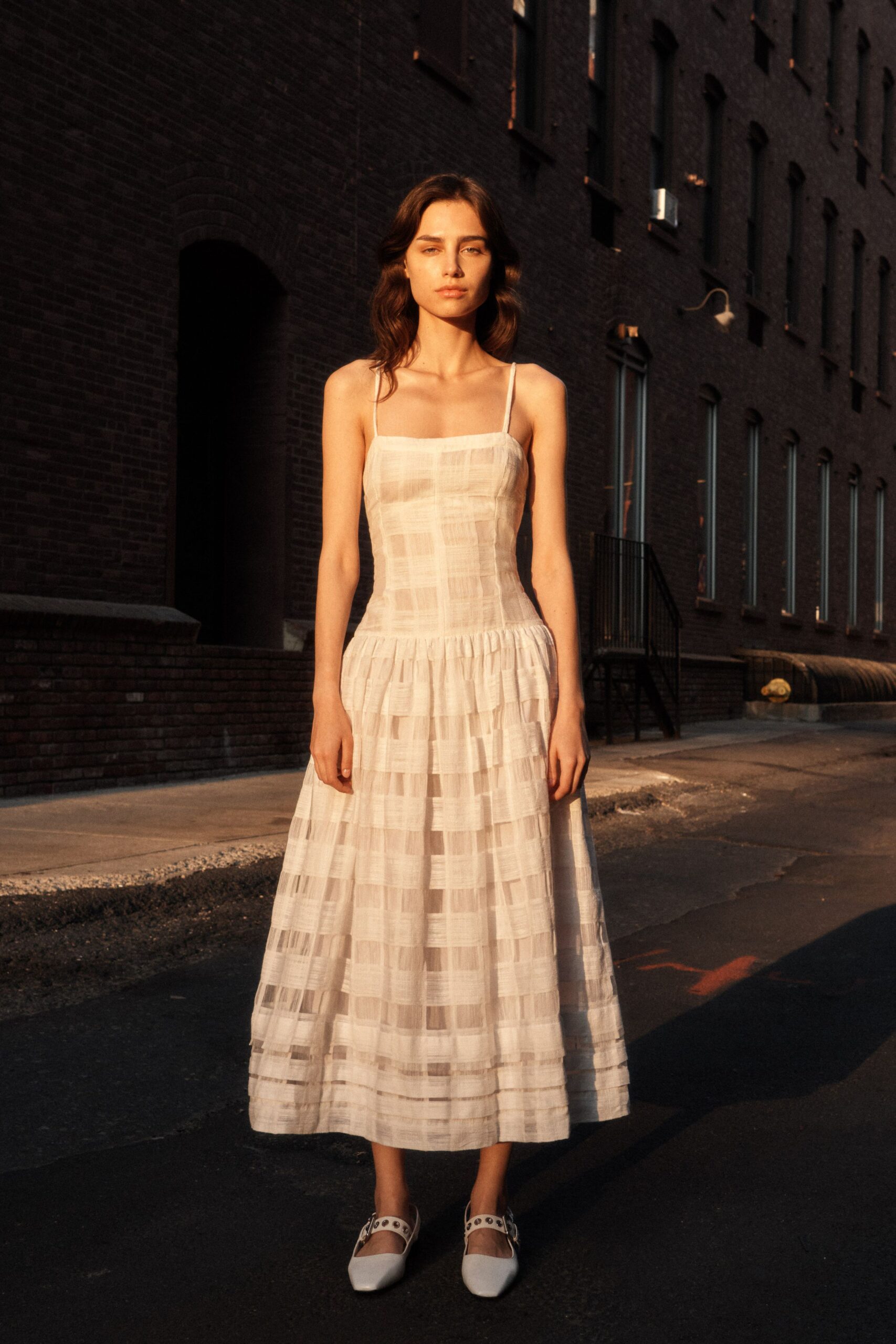 white cotton sleeveless midi dress