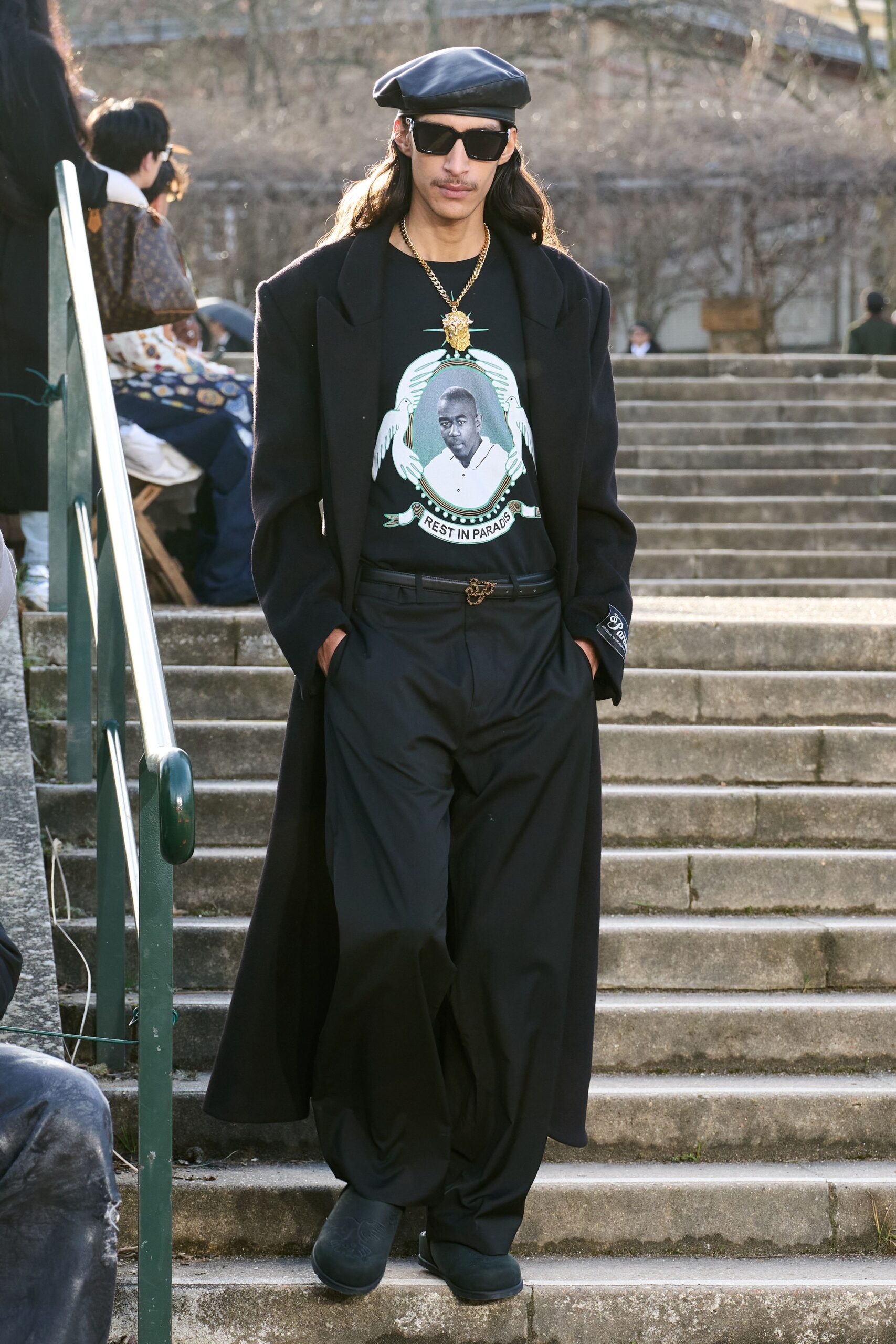 black coat t-shirt pants outfit