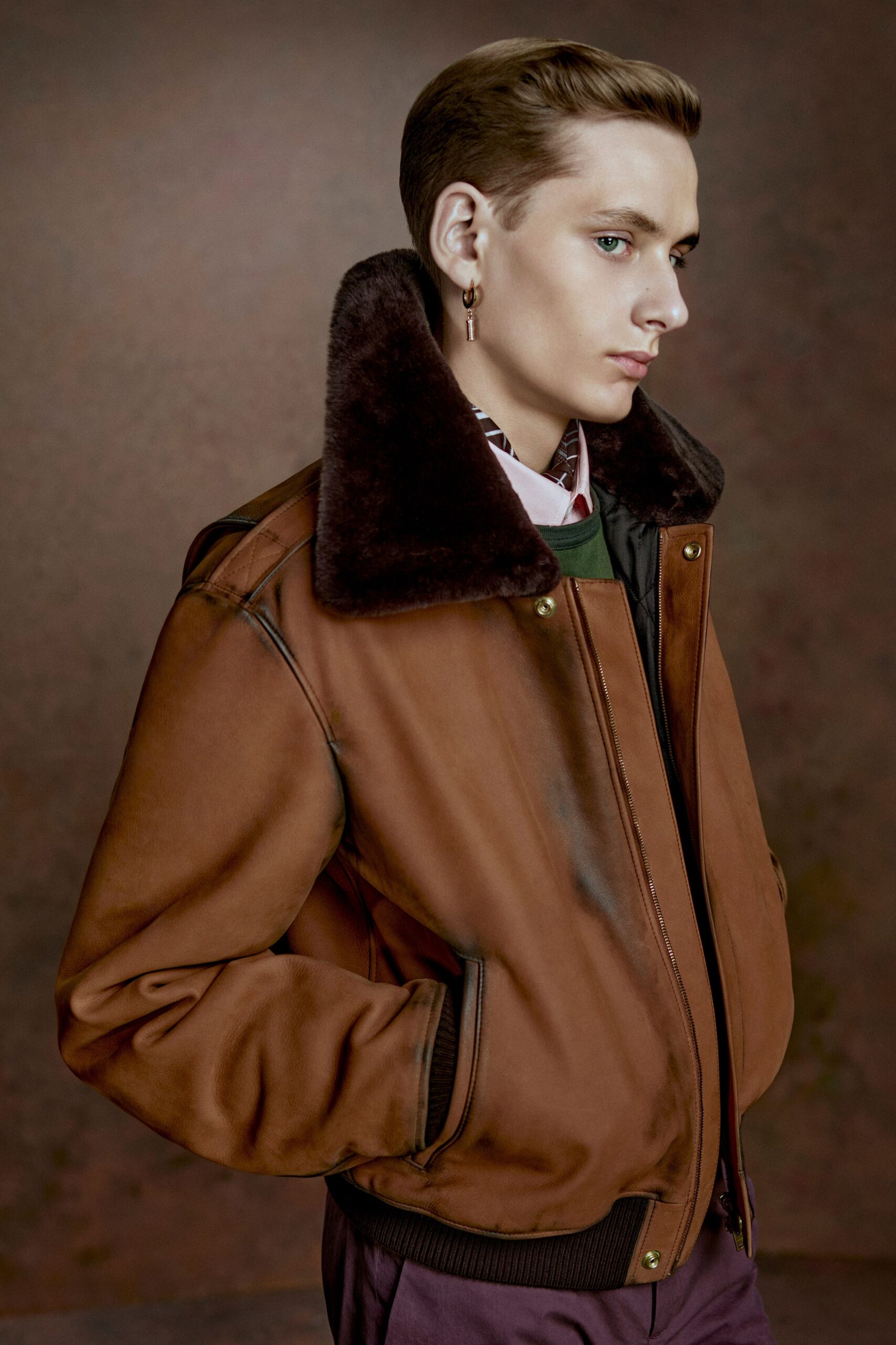 brown leather fitted jacket and white shirt