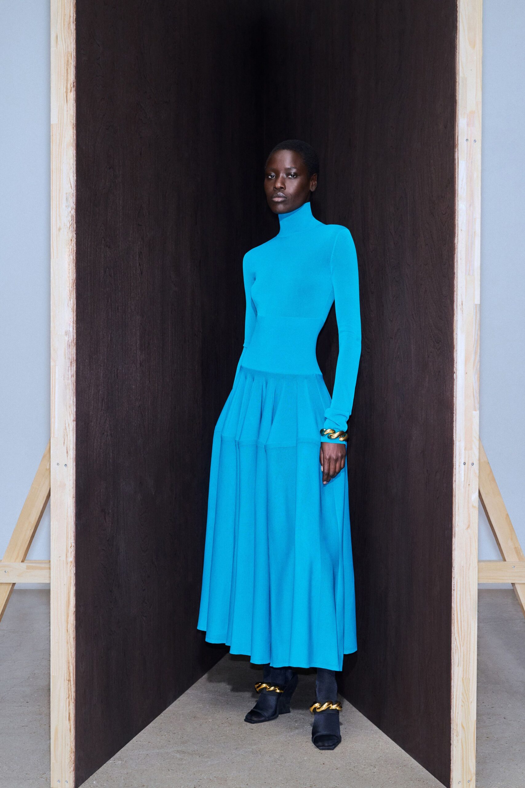 blue cotton long-sleeve high-neck fitted pleated midi dress