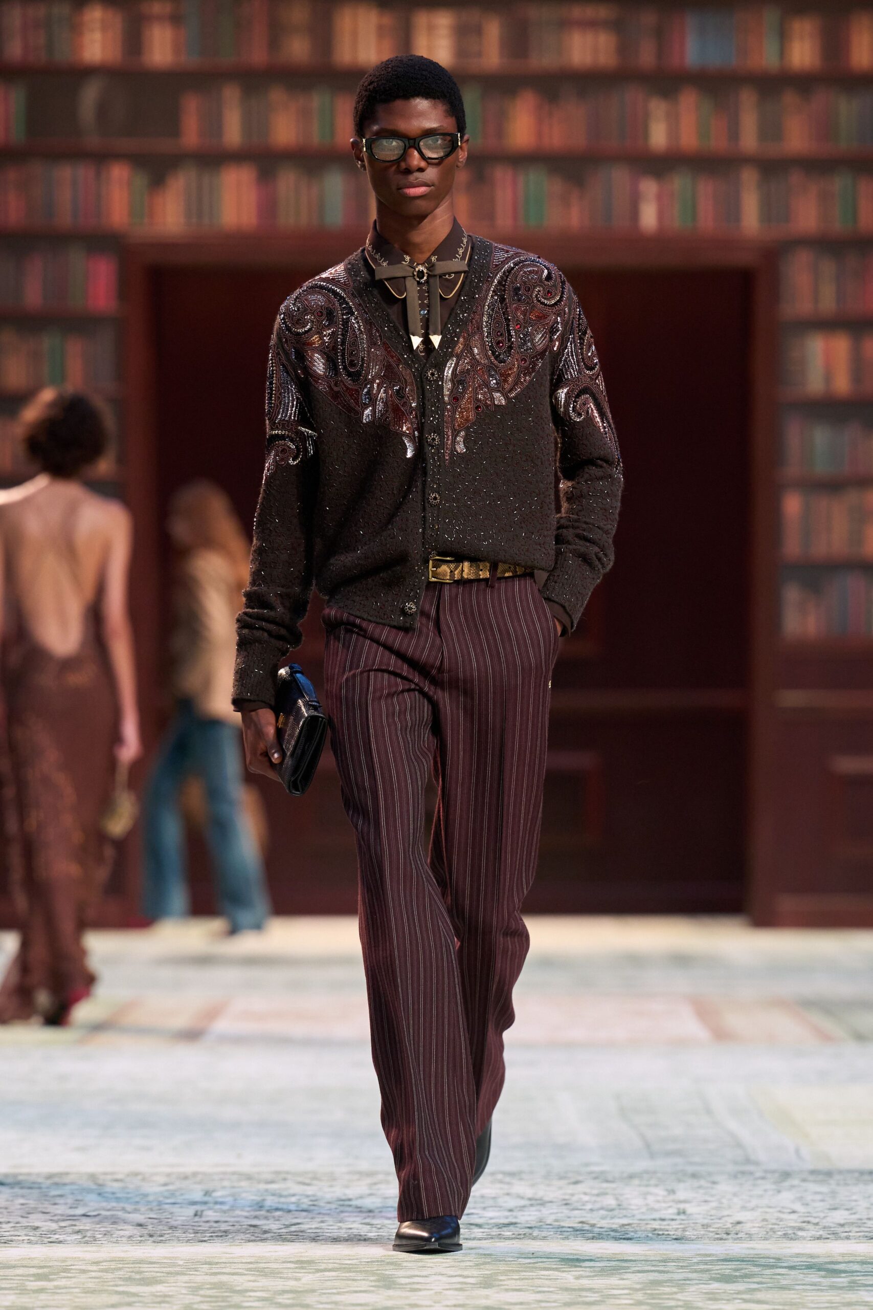 black embroidered cardigan with striped pants